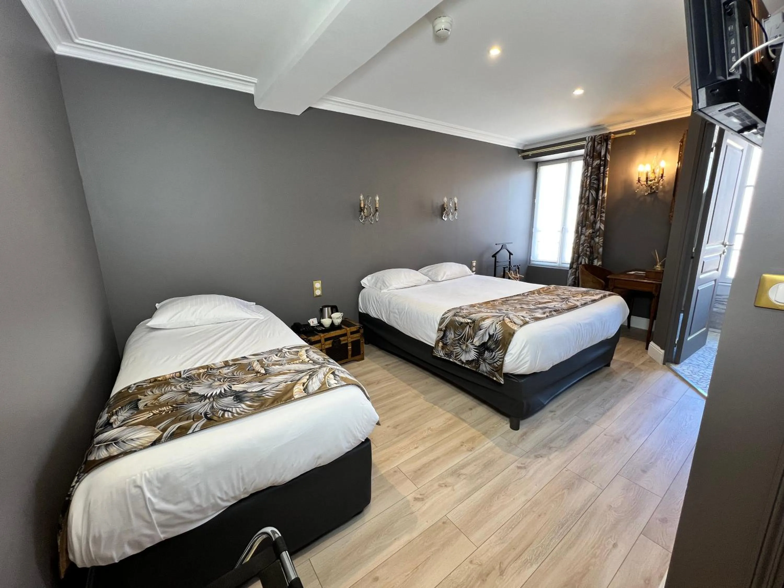 Bed in Hotel De La Poste