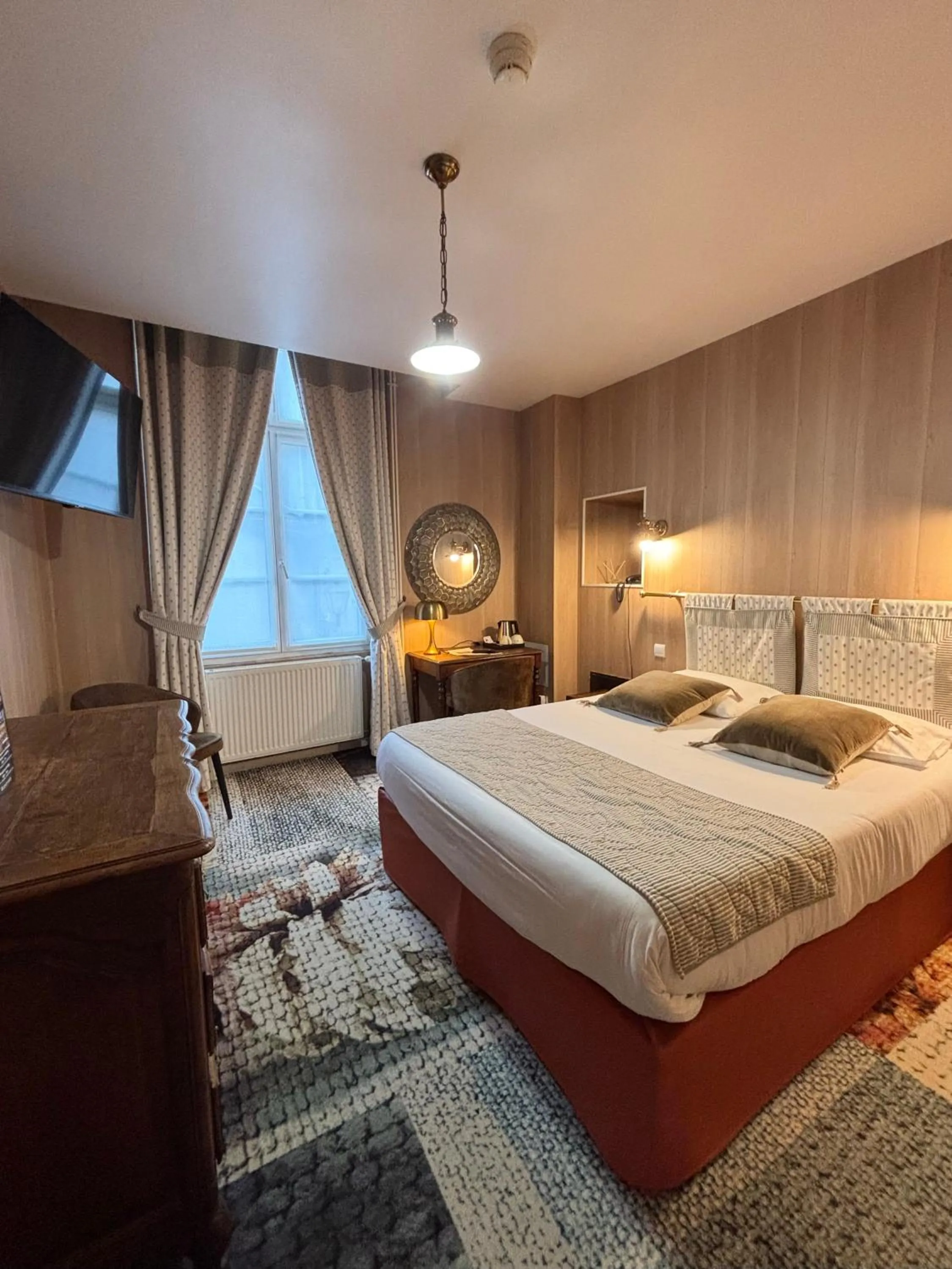 Bed in Hotel De La Poste