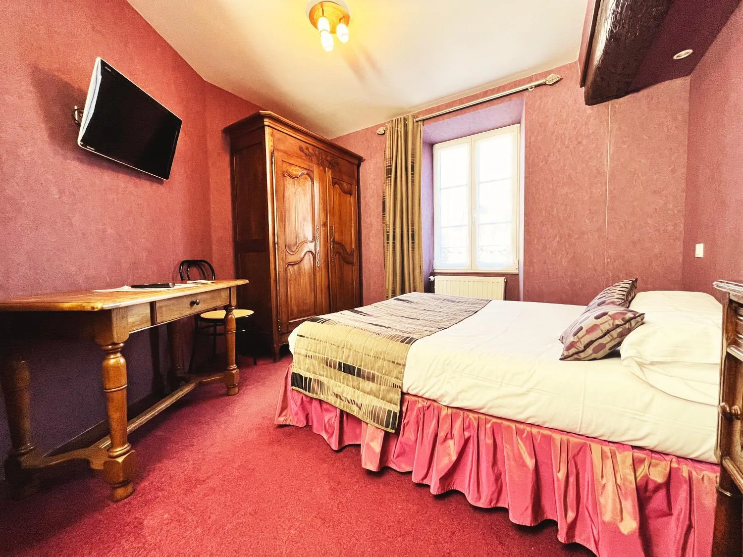 Bed in Hotel De La Poste