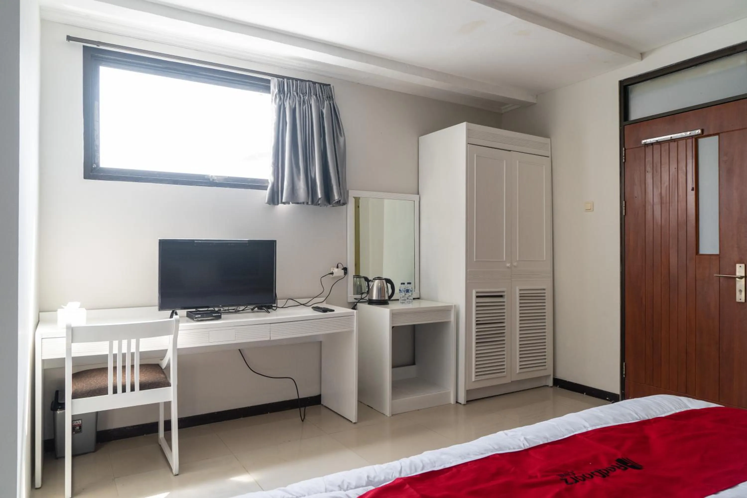 Bedroom in RedDoorz Plus @ Sawah Besar