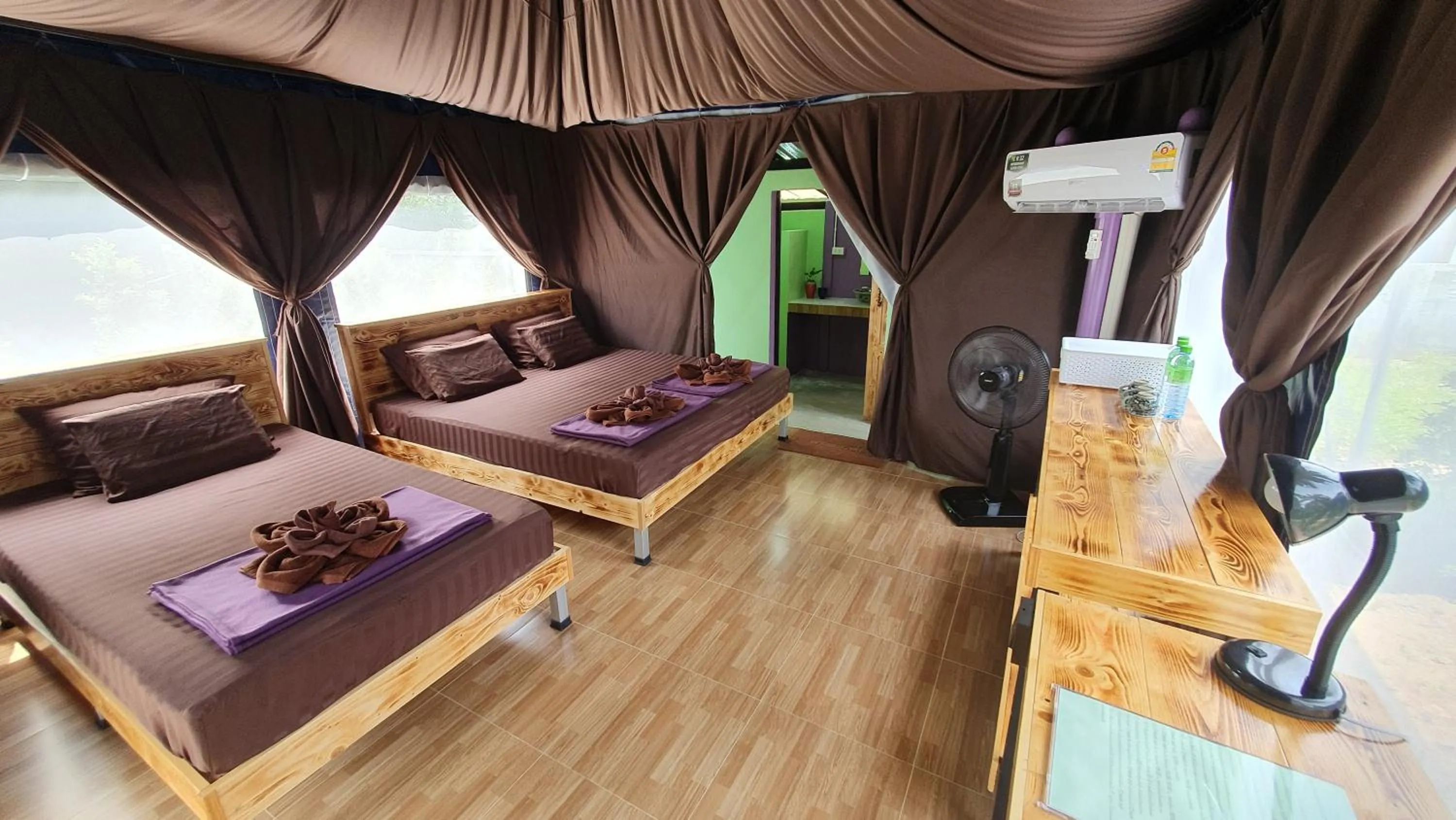 Photo of the whole room, Bed in Moonshine Resort Chumphon
