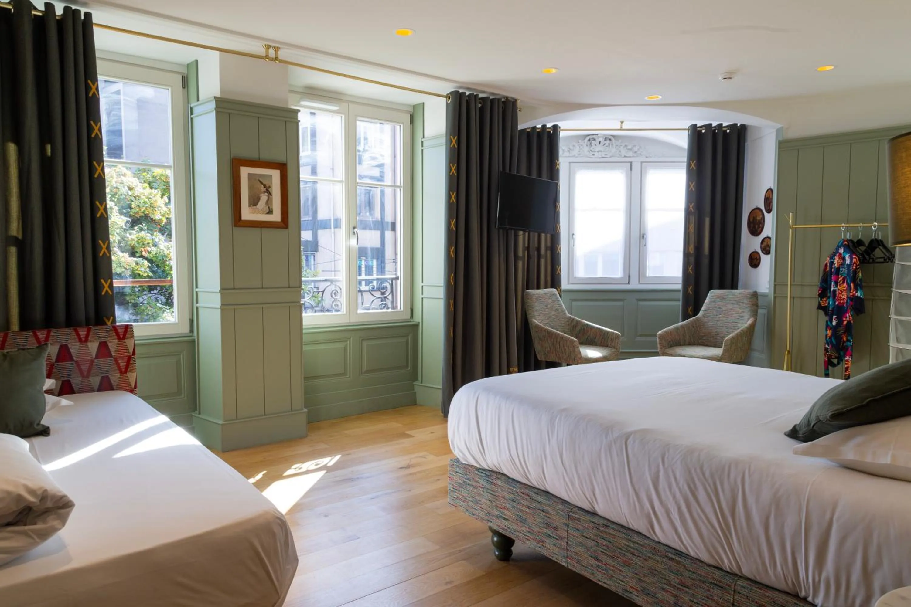 Bed in Le Kléber Hôtel