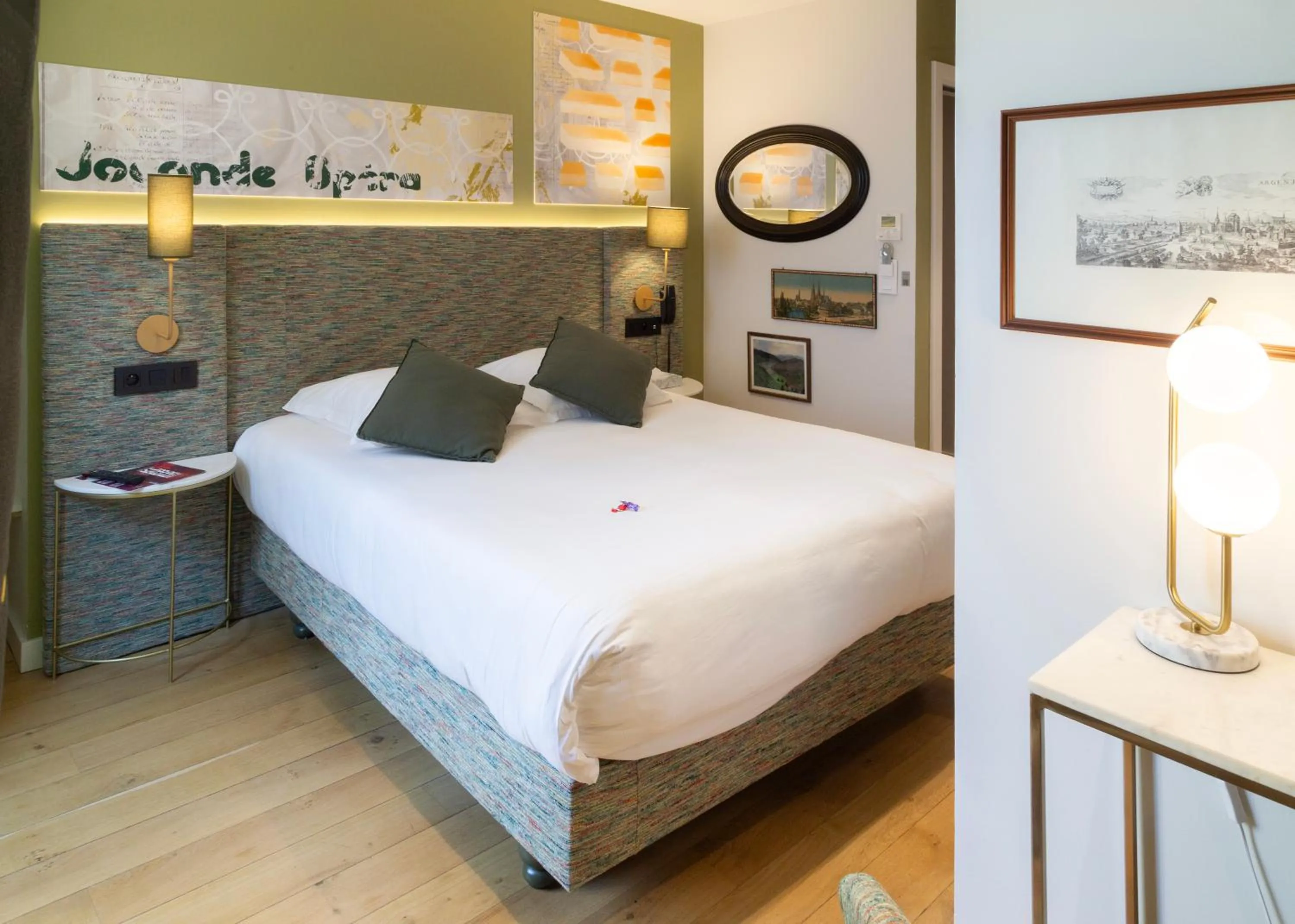 Bed in Le Kléber Hôtel