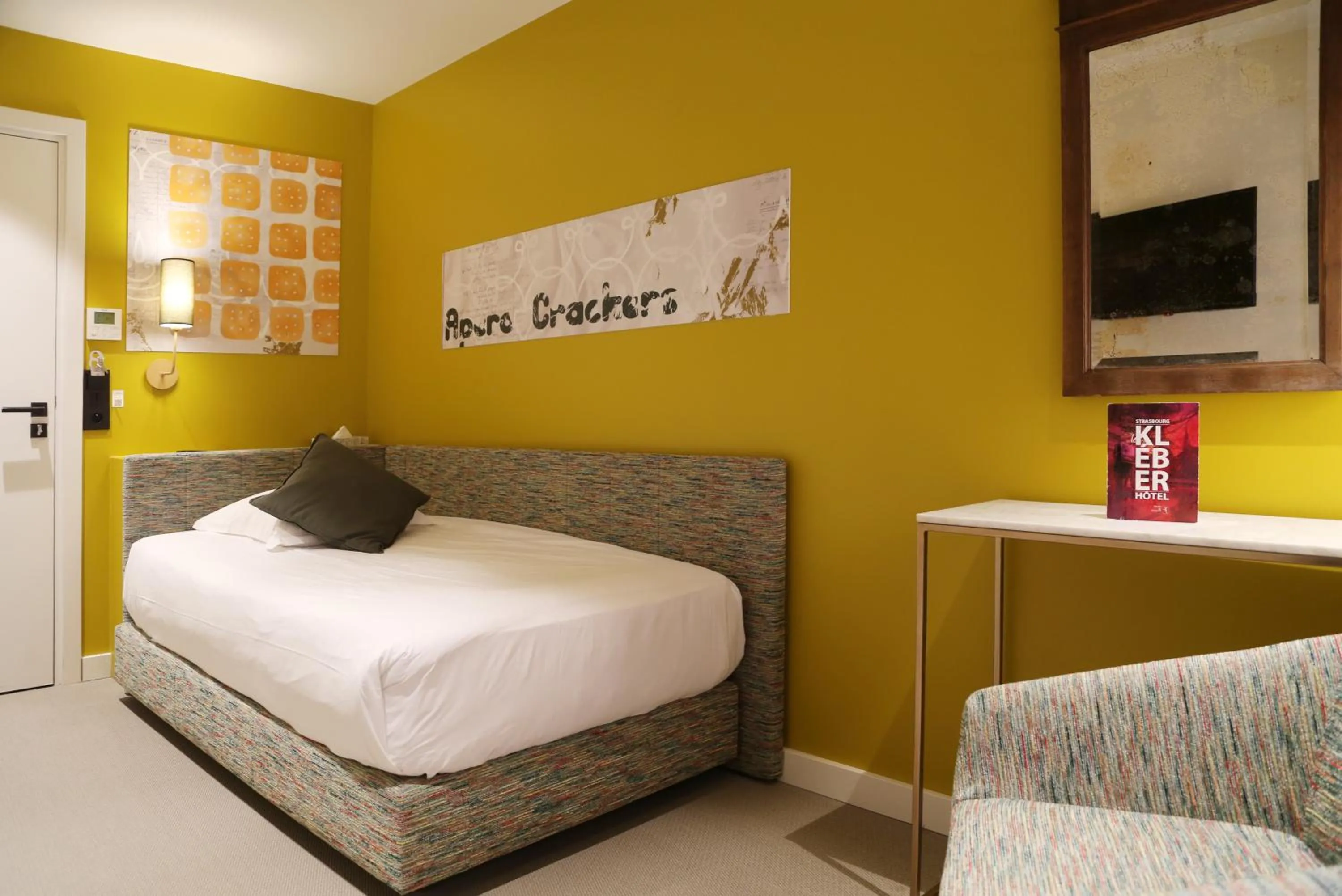 Bed in Le Kléber Hôtel