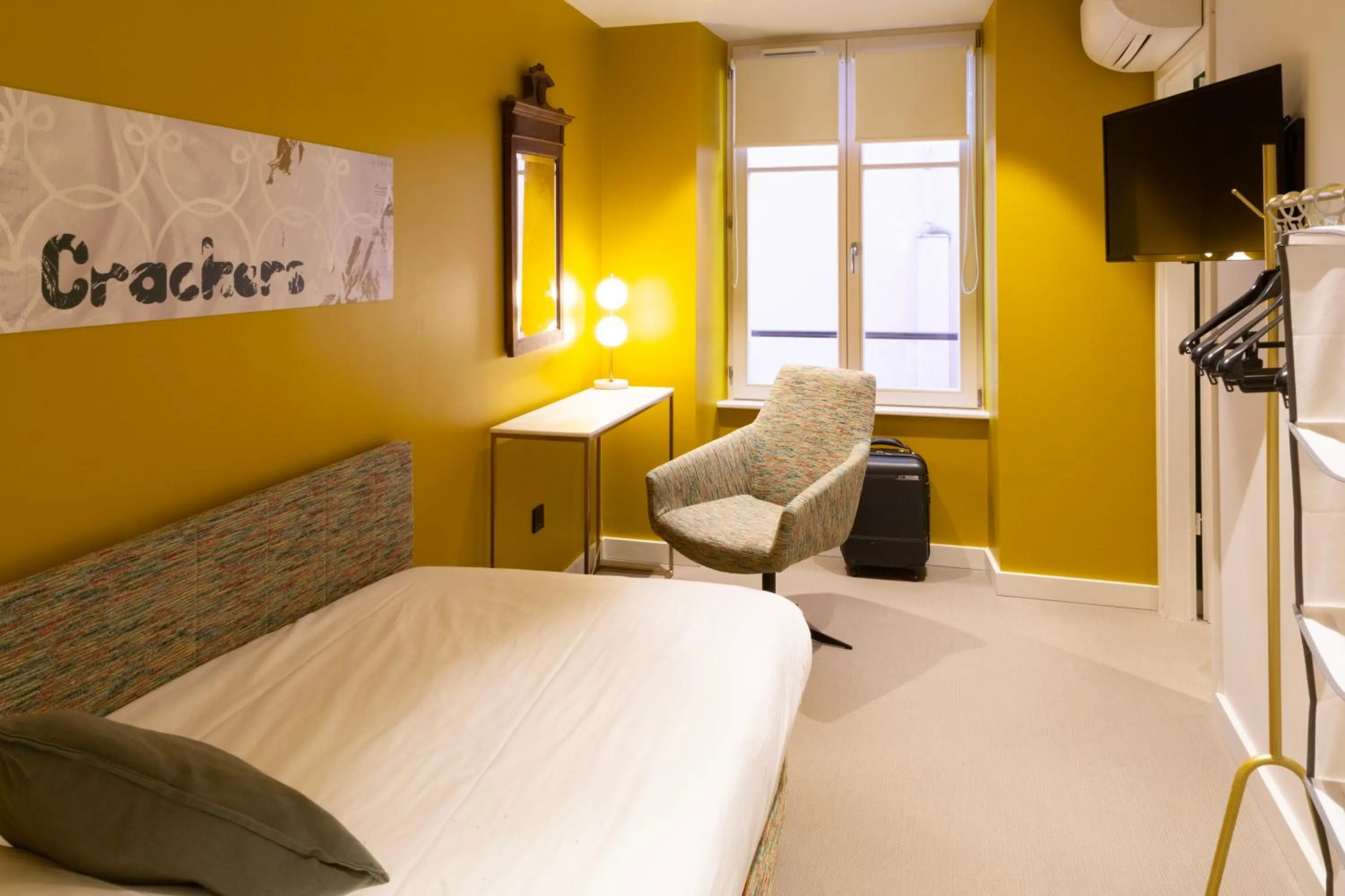 Bed in Le Kléber Hôtel