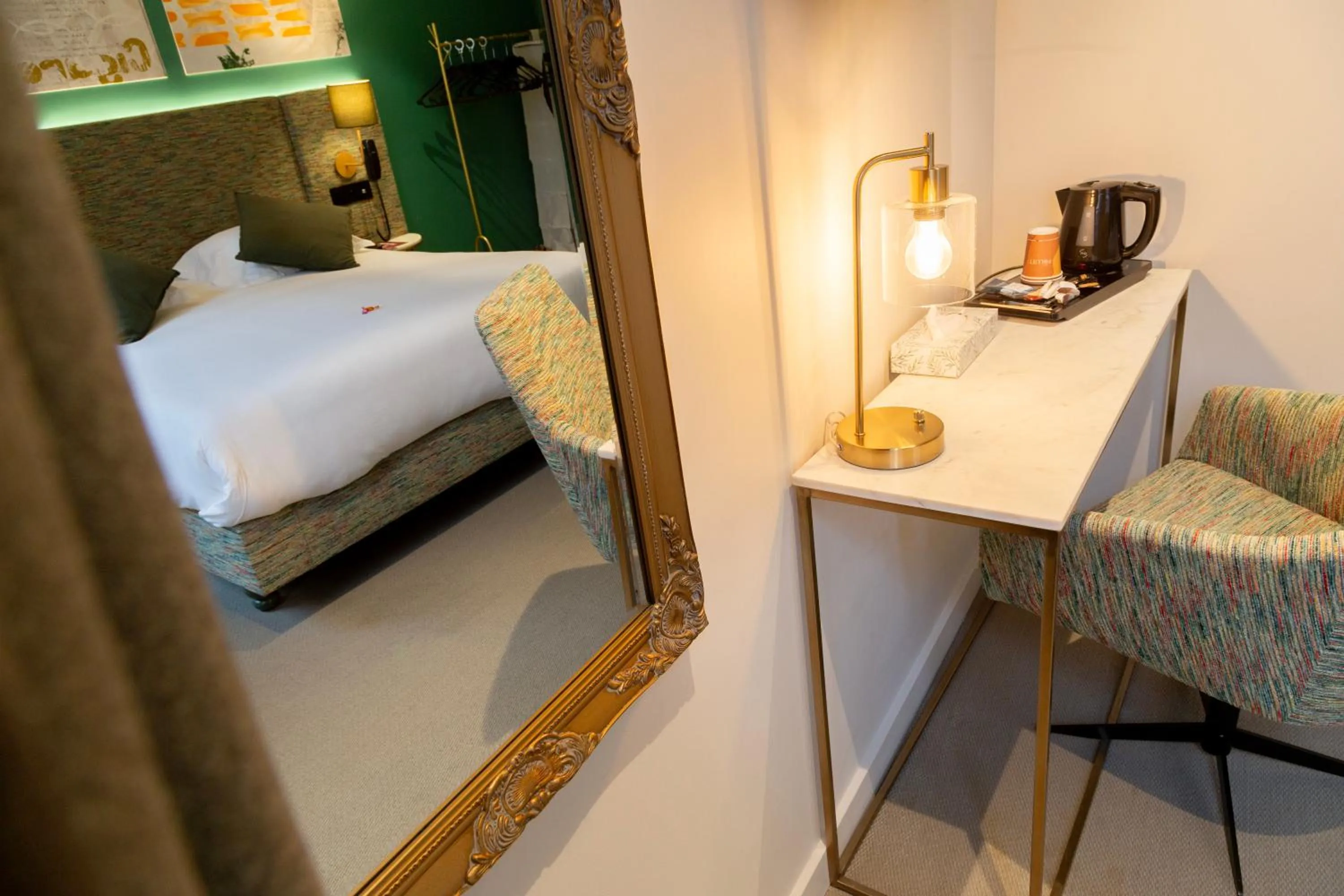 Bed in Le Kléber Hôtel