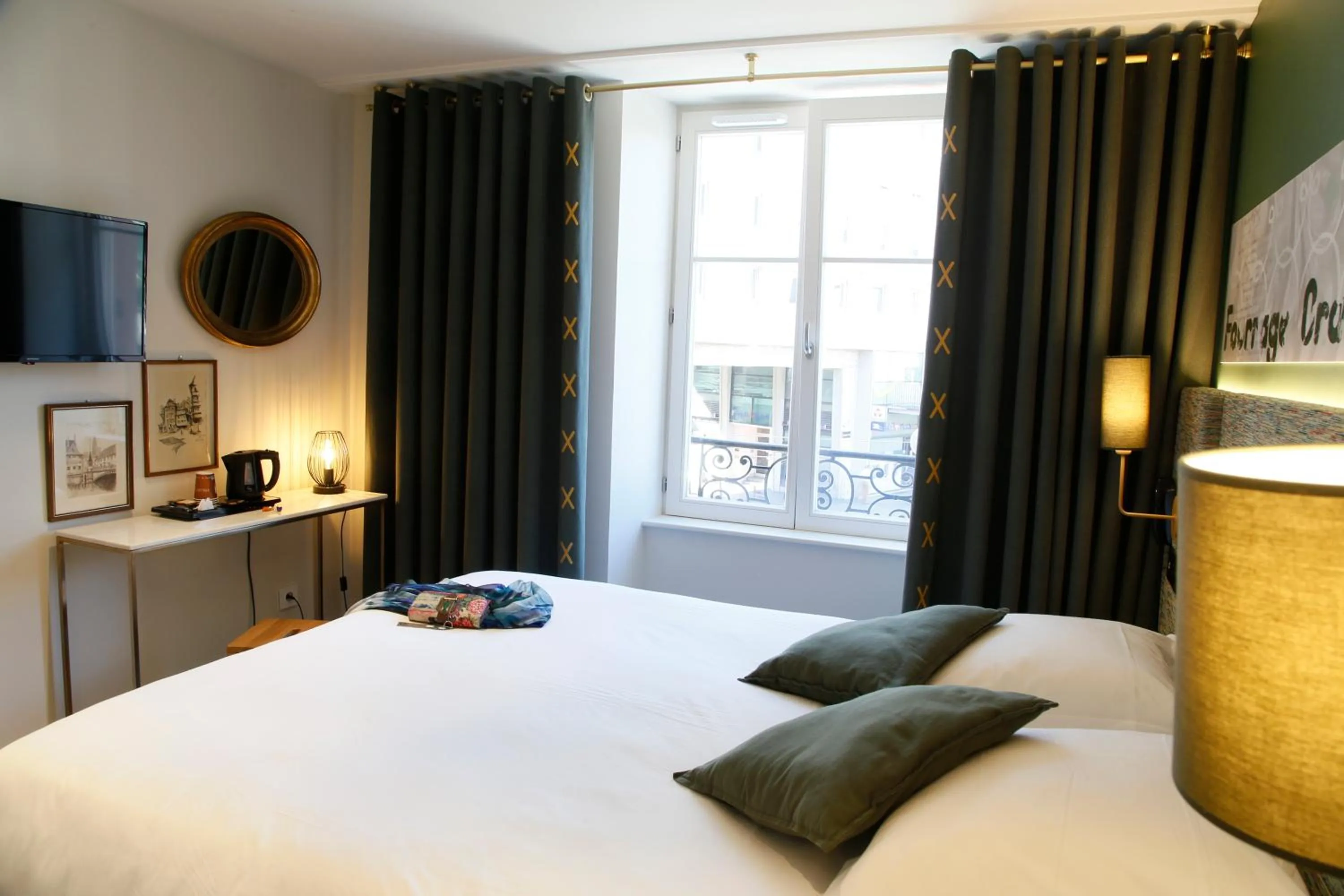 Bed in Le Kléber Hôtel