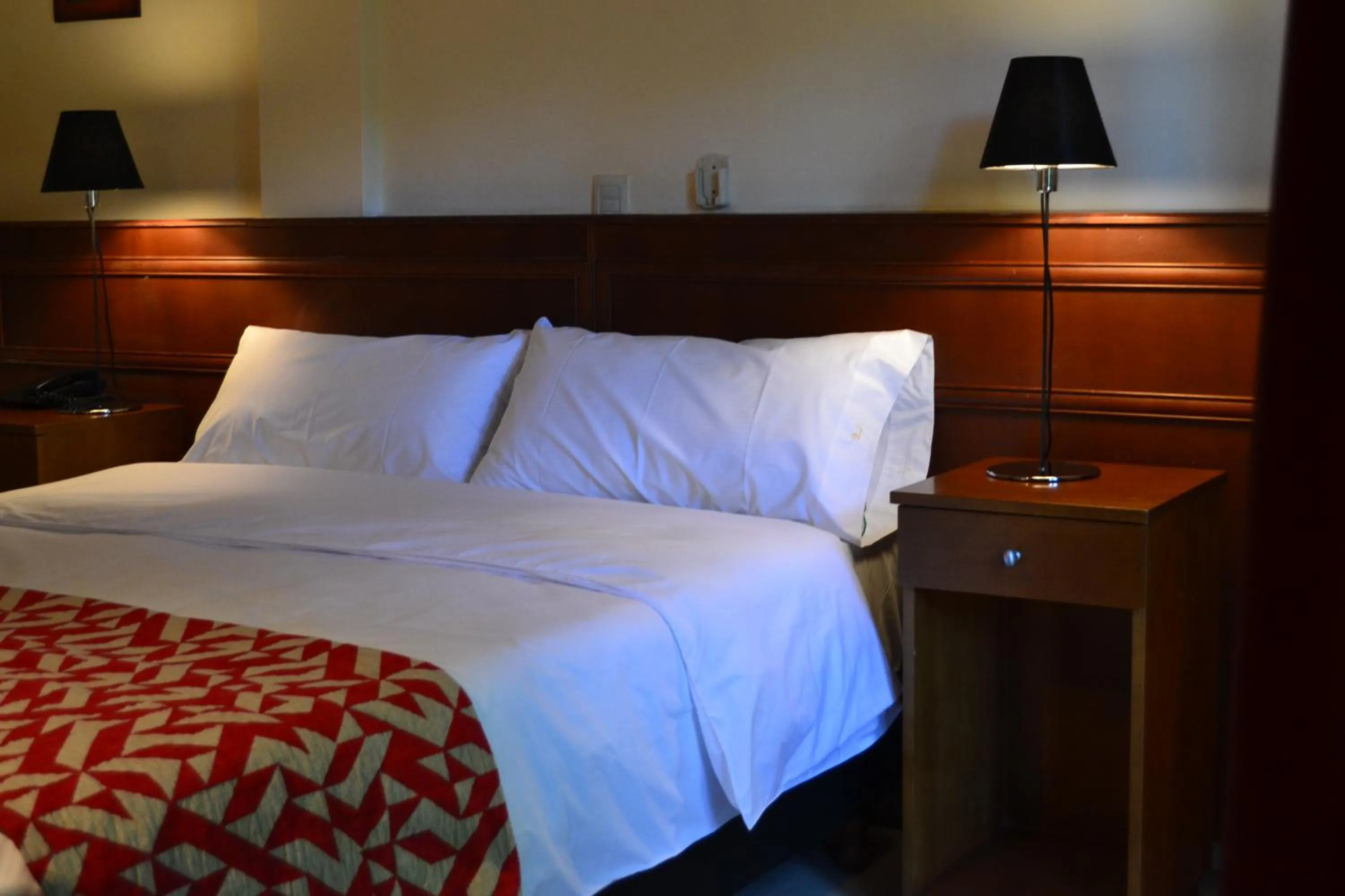 Bed in Los Espinillos Hotel y Spa