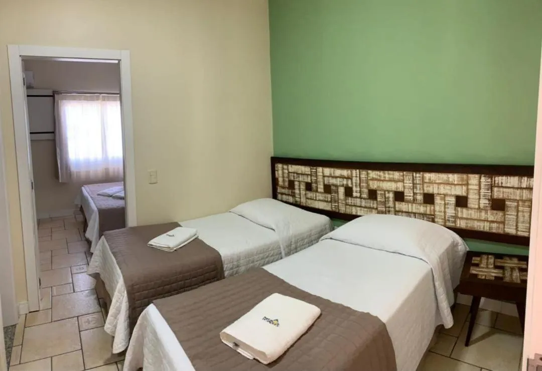 Bed in Pousada Vô Jaques