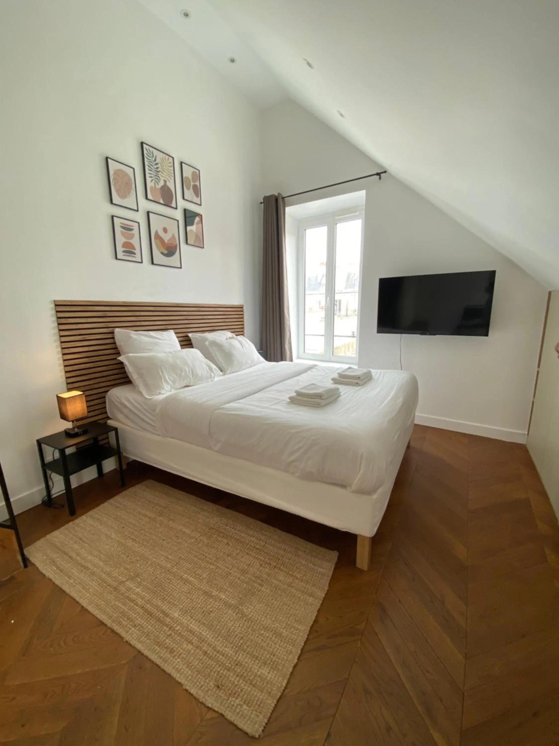 Bed in Maison le Bac Apartments