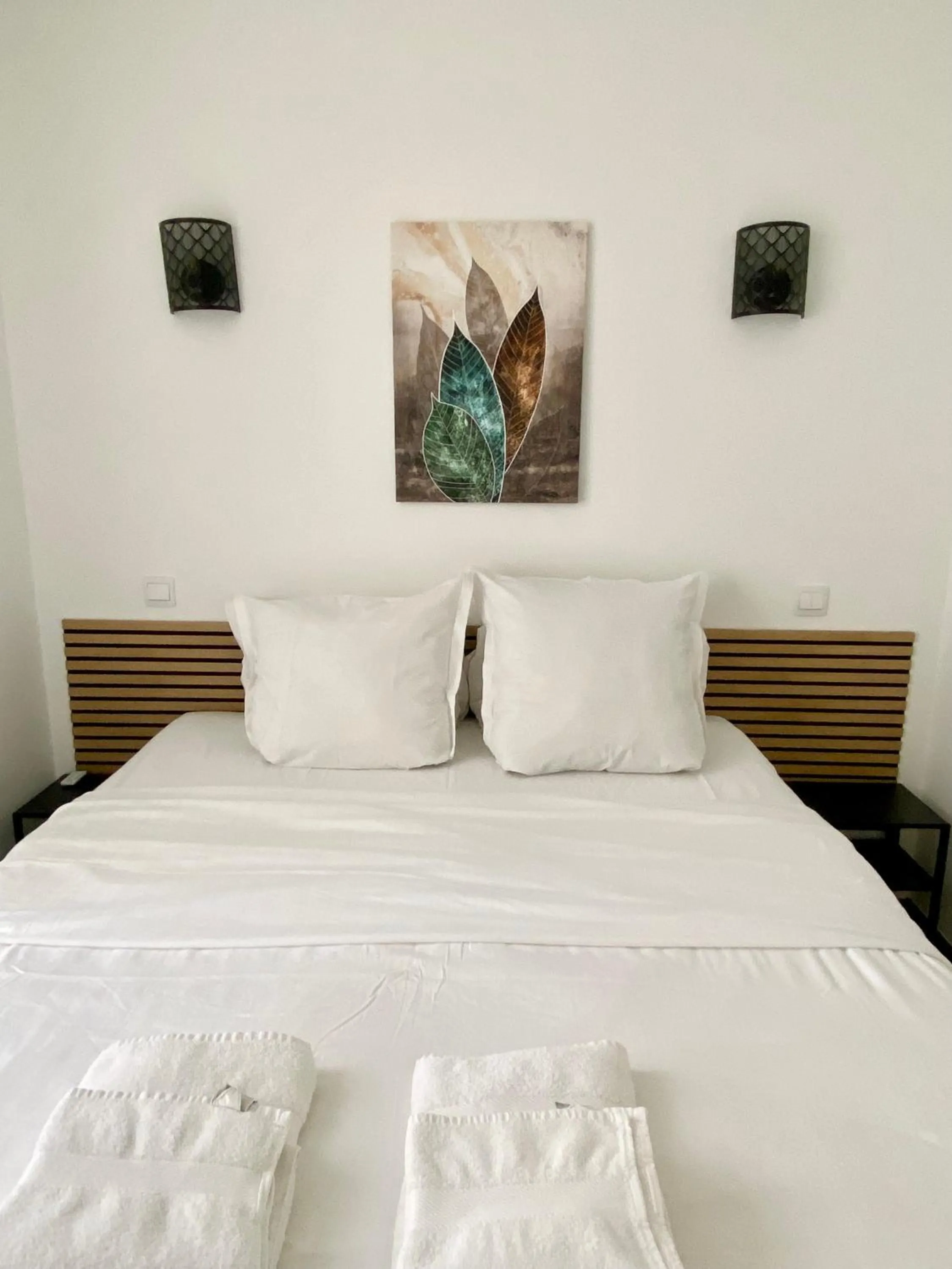 Bed in Maison le Bac Apartments