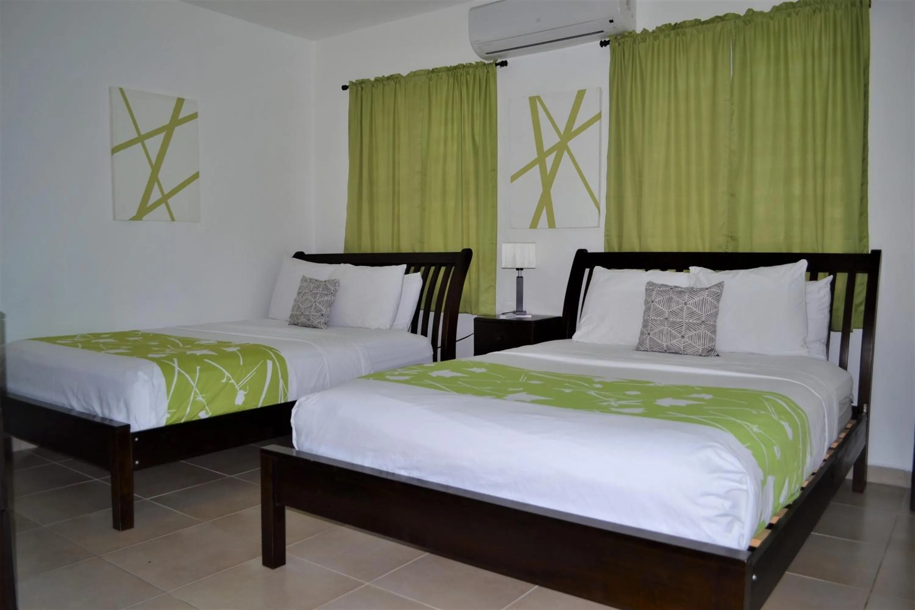 Photo of the whole room, Bed in Casa Verde Hotel - Steps to the Beach, Pool, Restaurant & Bar