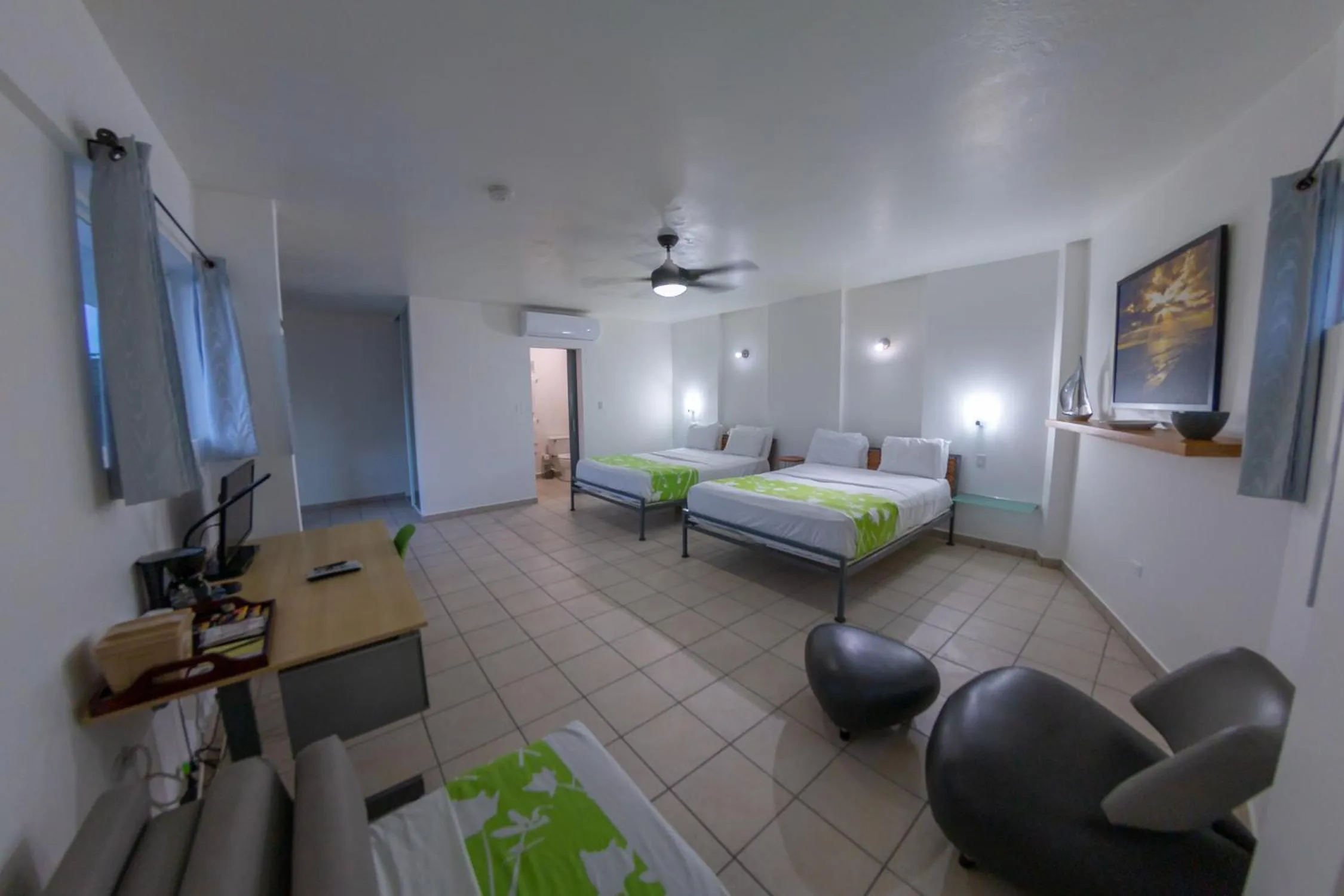 Photo of the whole room, Bed in Casa Verde Hotel - Steps to the Beach, Pool, Restaurant & Bar