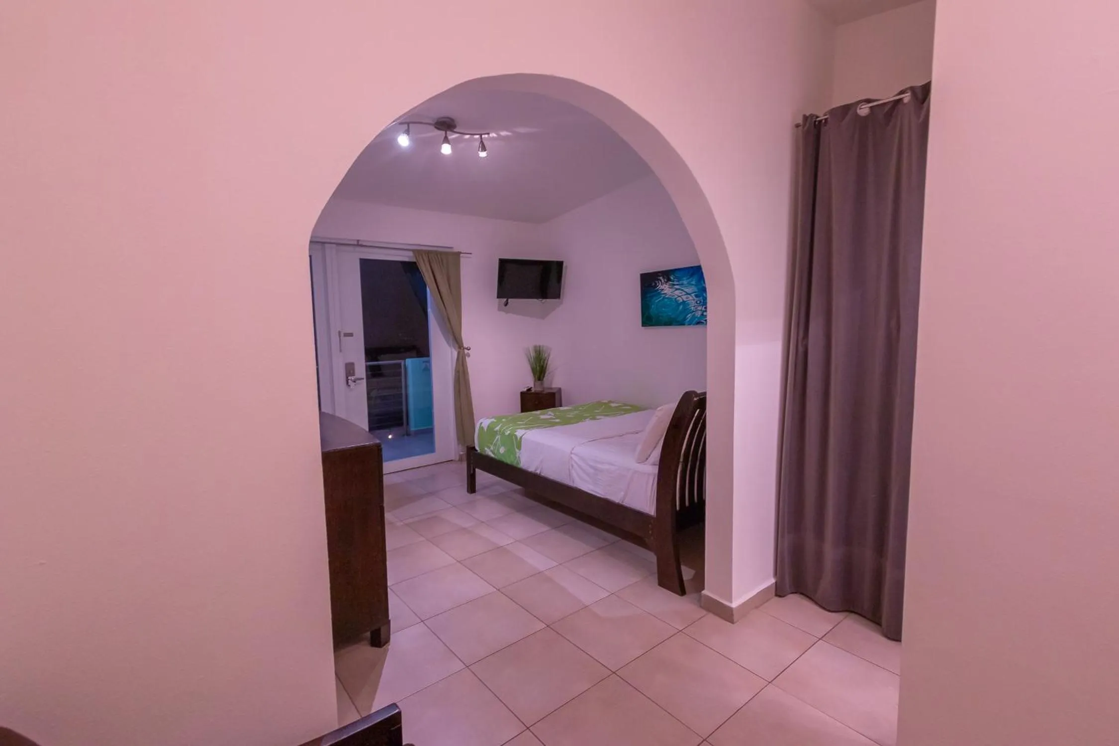 Photo of the whole room, Bed in Casa Verde Hotel - Steps to the Beach, Pool, Restaurant & Bar