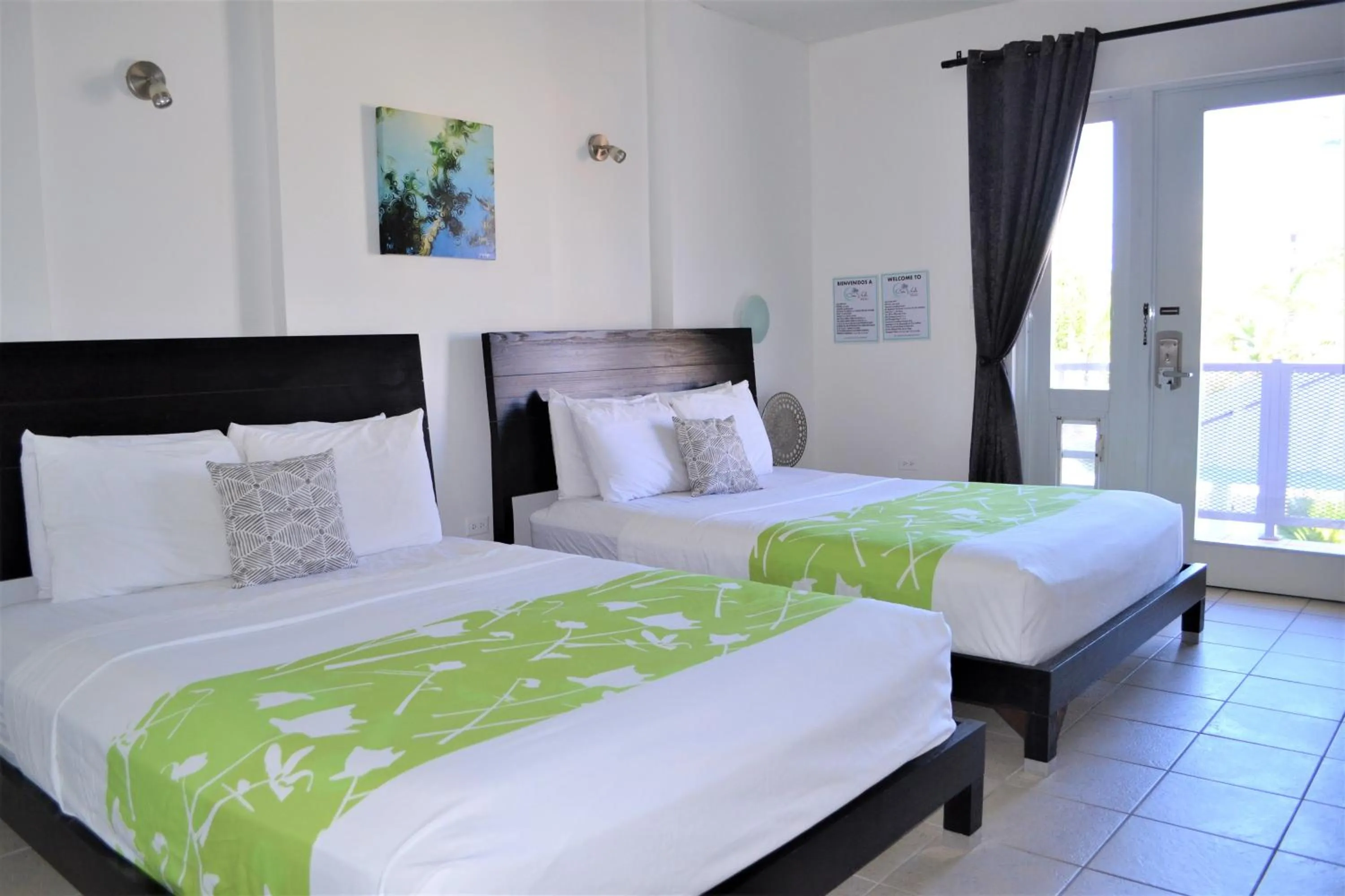 Photo of the whole room, Bed in Casa Verde Hotel - Steps to the Beach, Pool, Restaurant & Bar