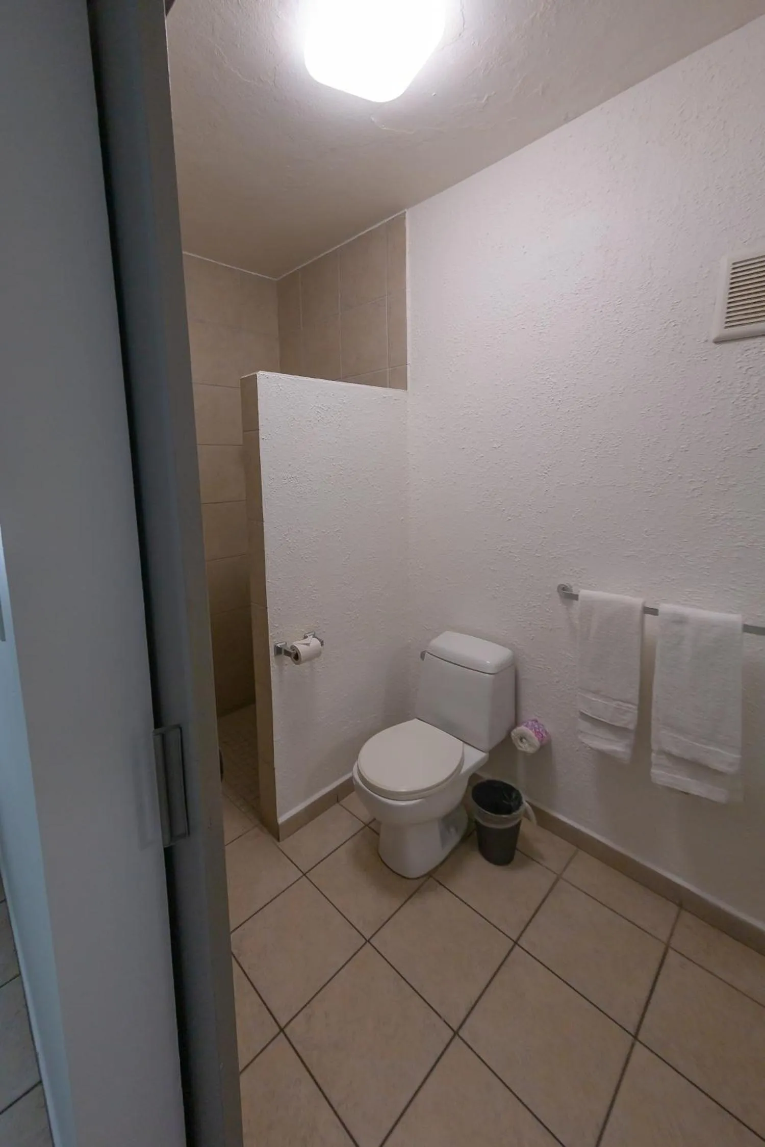 Toilet in Casa Verde Hotel - Steps to the Beach, Pool, Restaurant & Bar