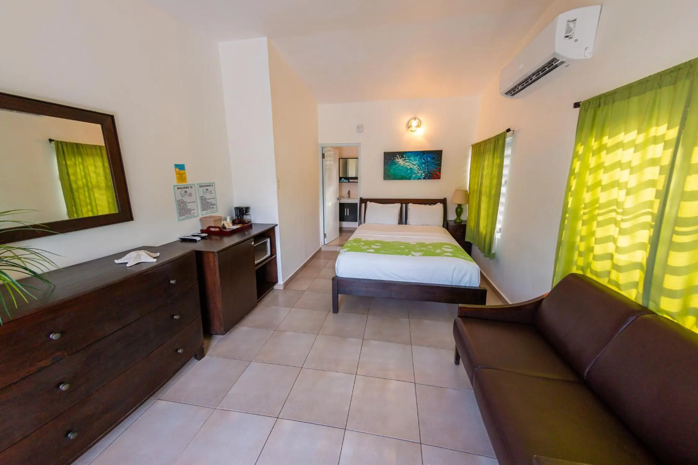 Photo of the whole room, Bed in Casa Verde Hotel - Steps to the Beach, Pool, Restaurant & Bar