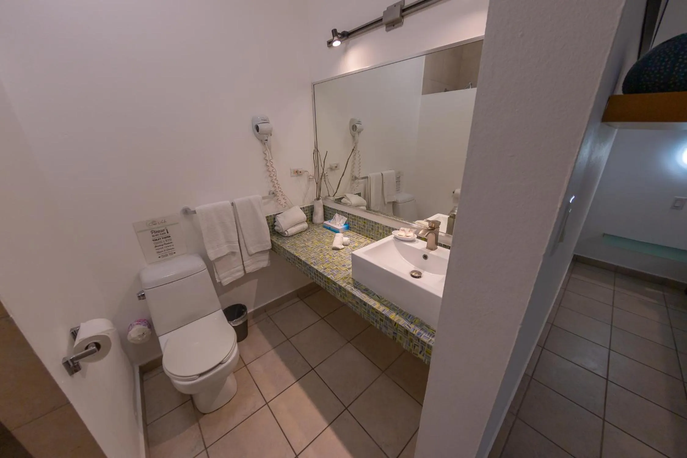 Bathroom in Casa Verde Hotel - Steps to the Beach, Pool, Restaurant & Bar