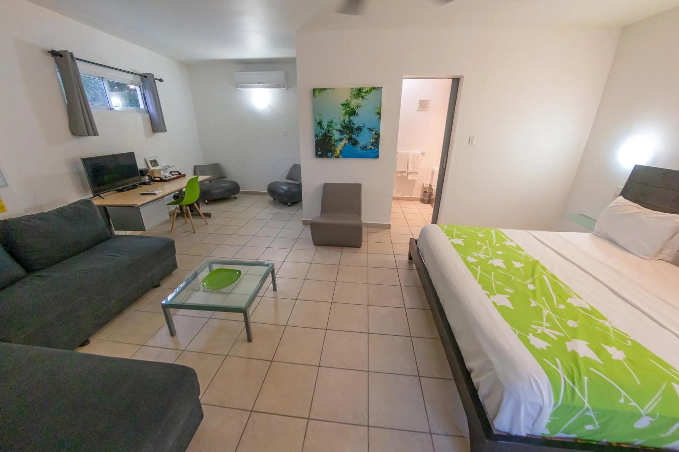 Bed in Casa Verde Hotel - Steps to the Beach, Pool, Restaurant & Bar