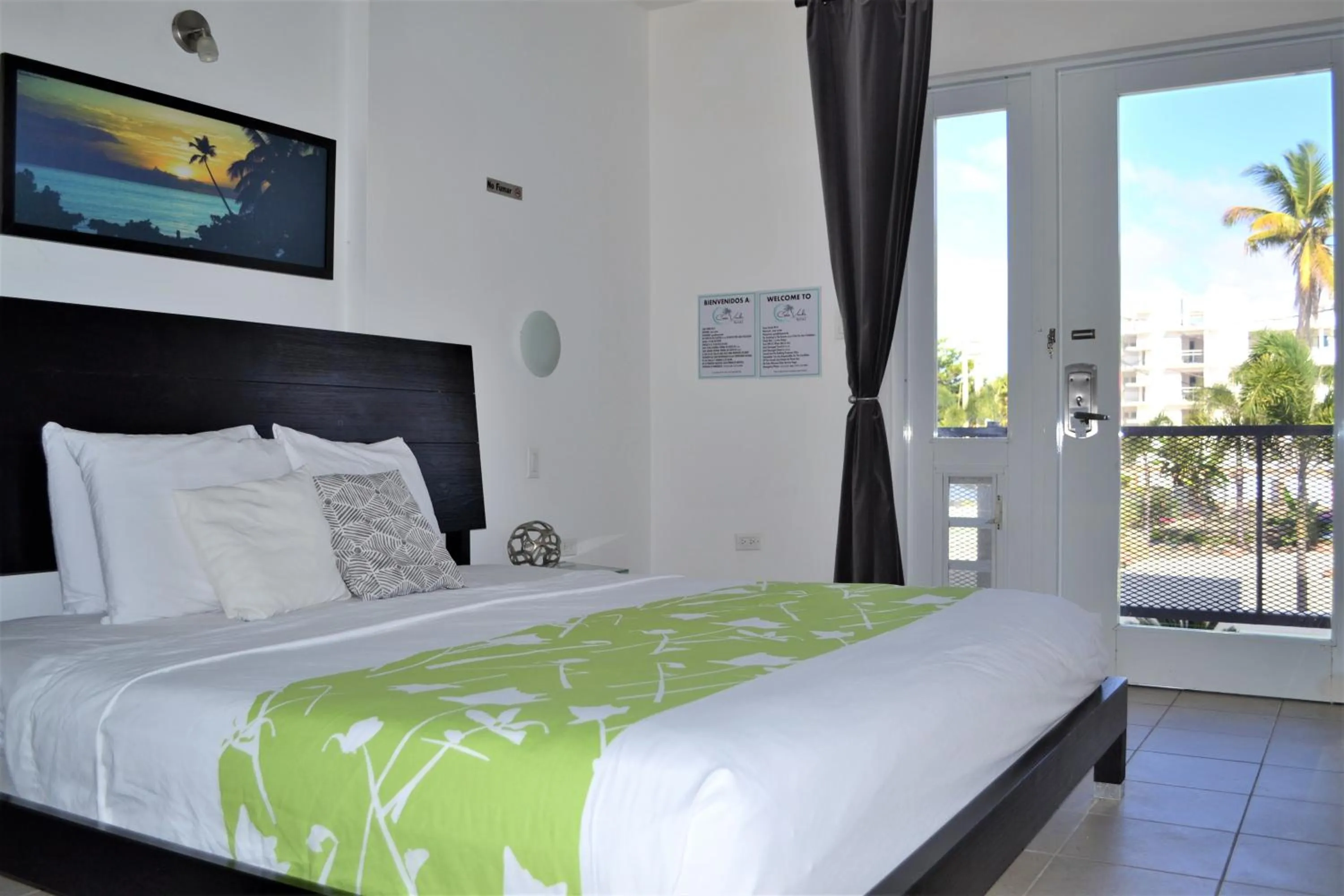 Bed in Casa Verde Hotel - Steps to the Beach, Pool, Restaurant & Bar