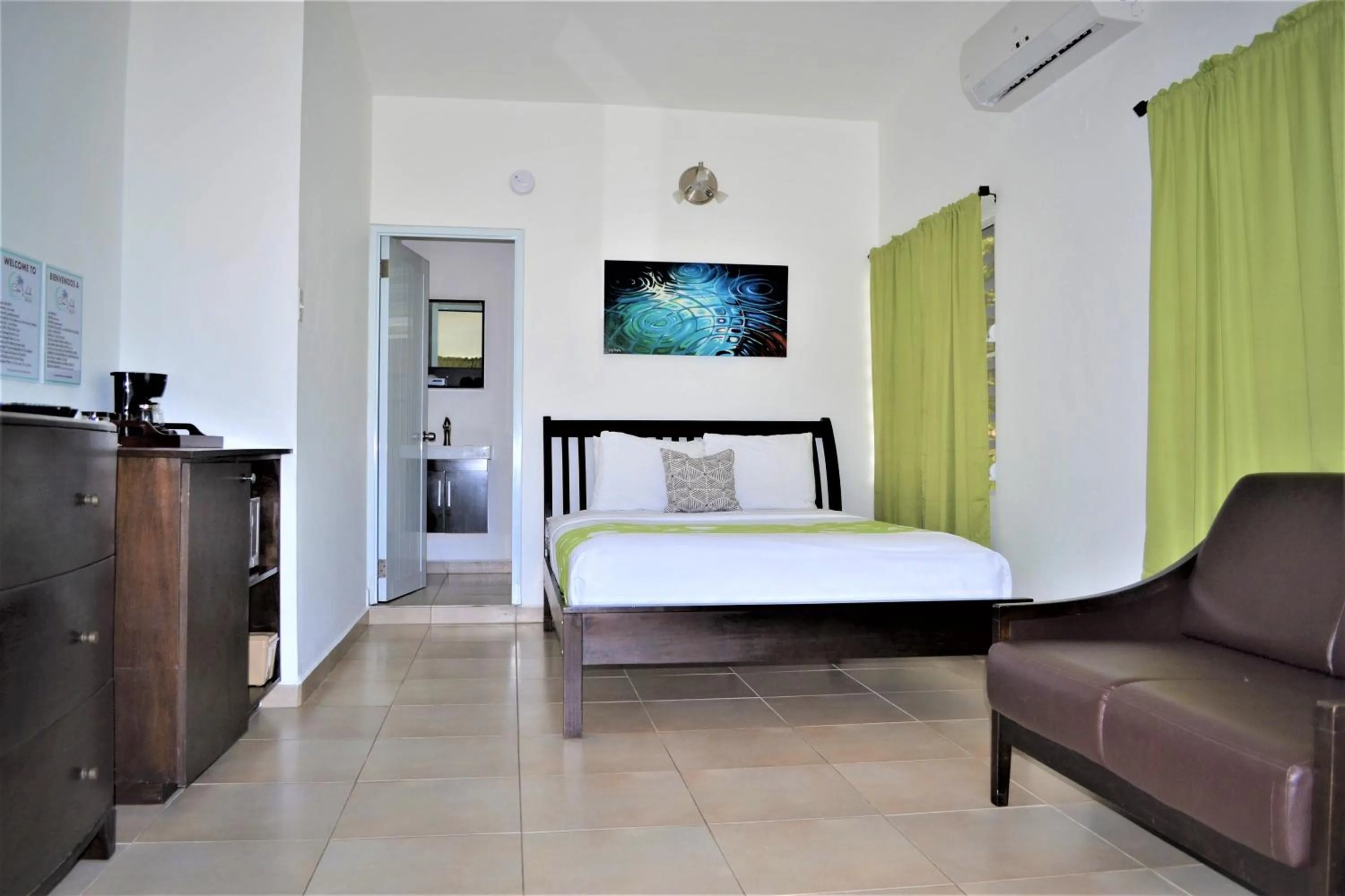 Photo of the whole room, Bed in Casa Verde Hotel - Steps to the Beach, Pool, Restaurant & Bar
