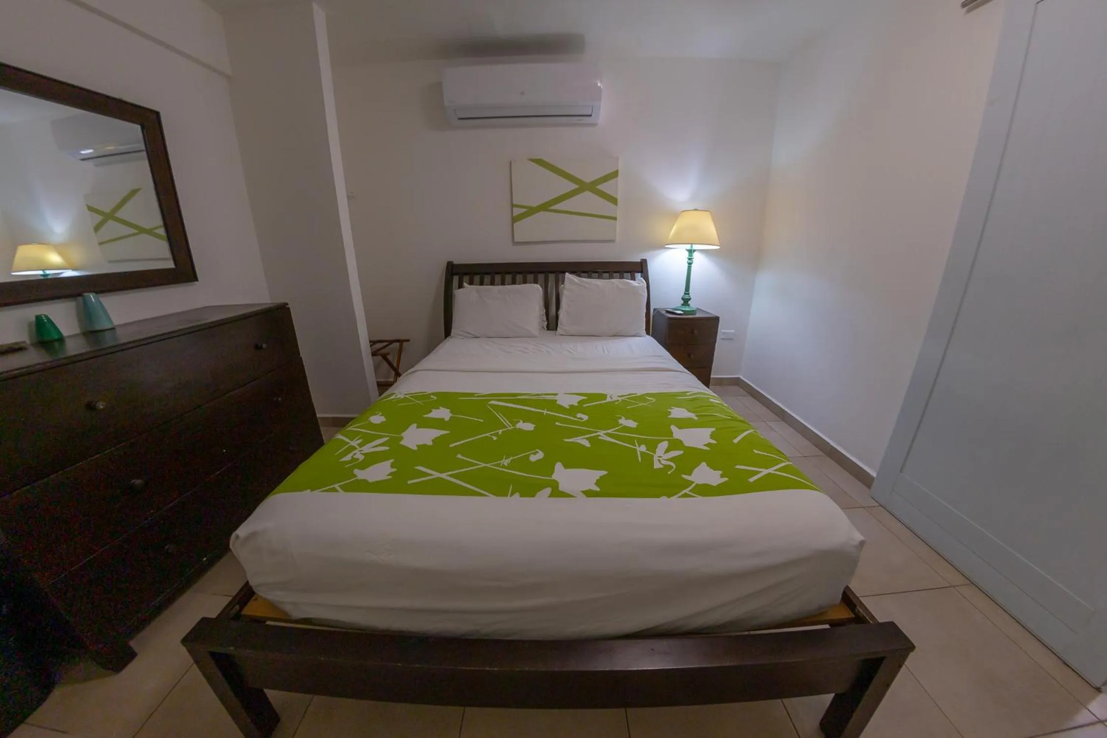 Bed in Casa Verde Hotel - Steps to the Beach, Pool, Restaurant & Bar