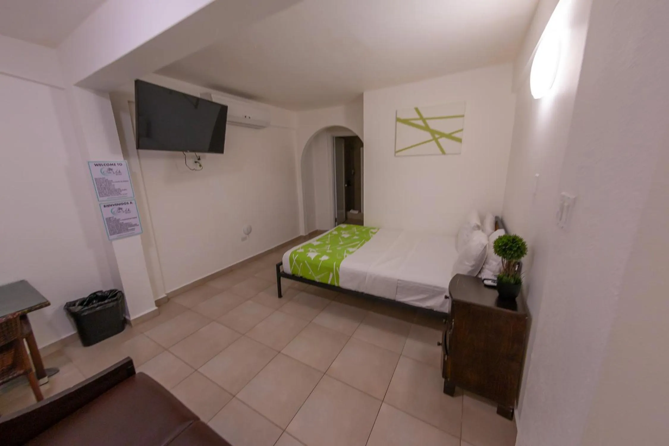 Photo of the whole room, Bed in Casa Verde Hotel - Steps to the Beach, Pool, Restaurant & Bar