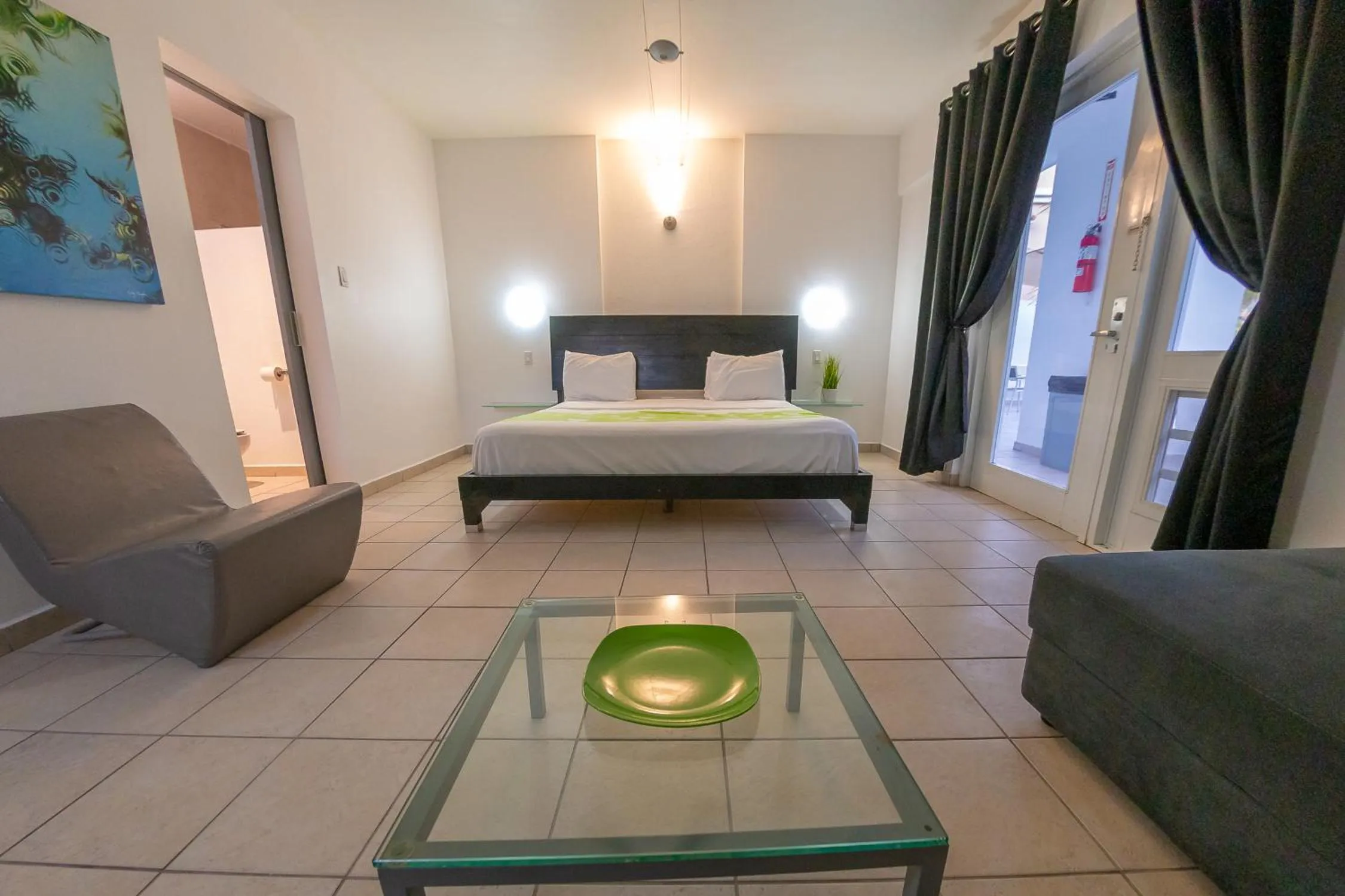 Photo of the whole room, Bed in Casa Verde Hotel - Steps to the Beach, Pool, Restaurant & Bar