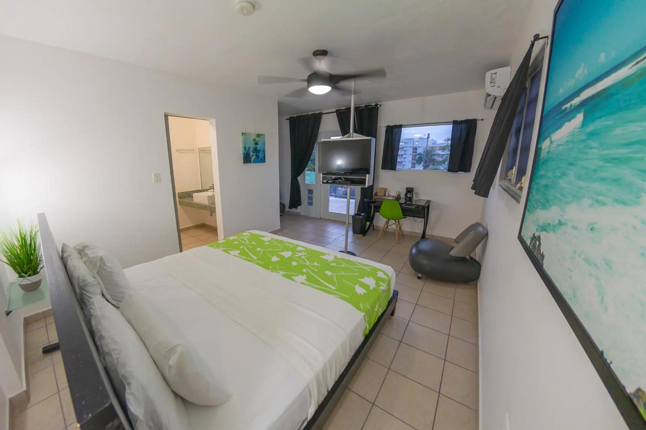 Photo of the whole room, Bed in Casa Verde Hotel - Steps to the Beach, Pool, Restaurant & Bar