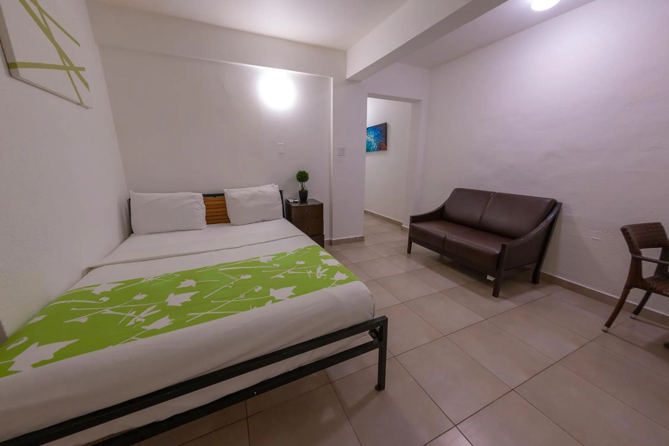 Photo of the whole room, Bed in Casa Verde Hotel - Steps to the Beach, Pool, Restaurant & Bar