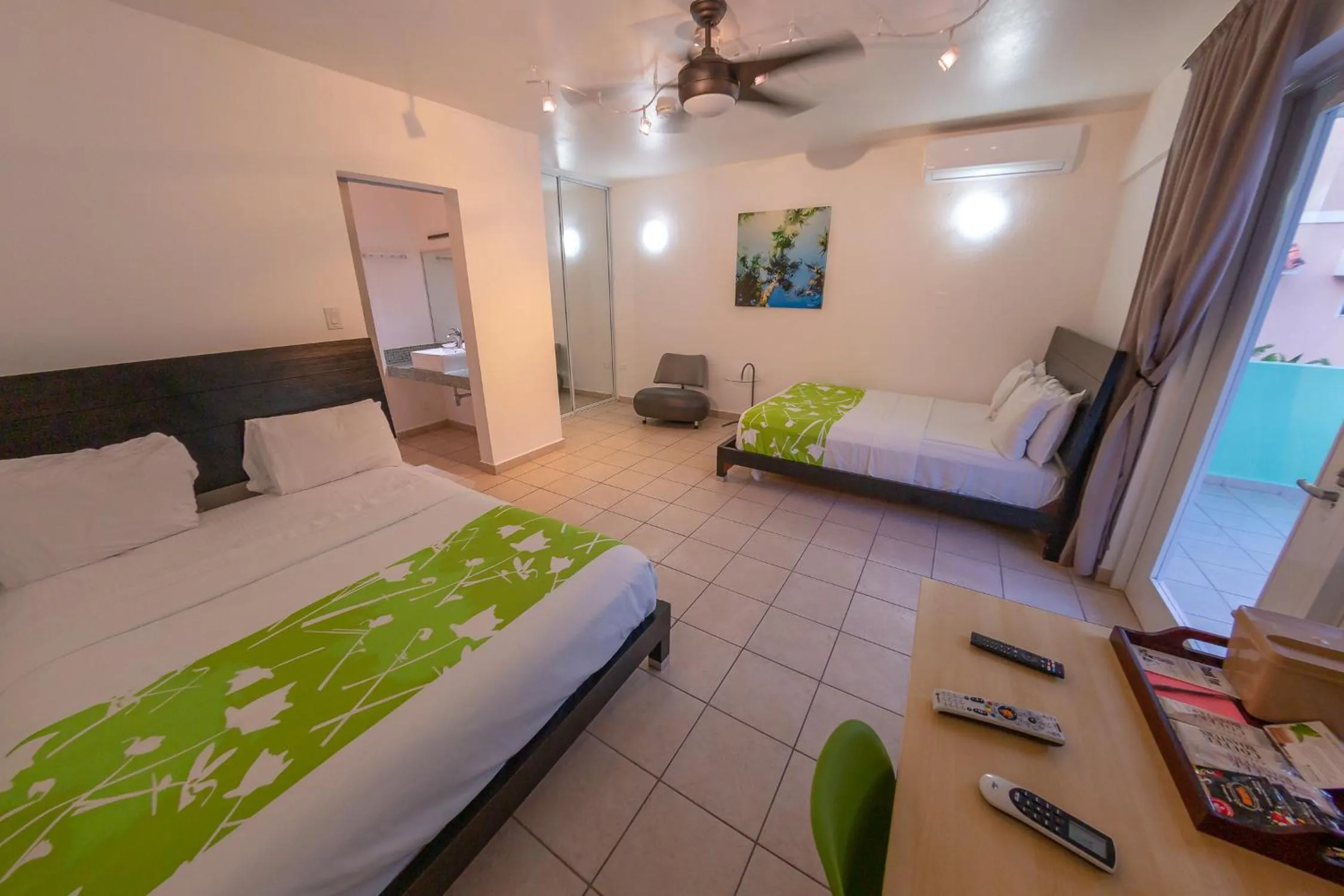 Photo of the whole room, Bed in Casa Verde Hotel - Steps to the Beach, Pool, Restaurant & Bar