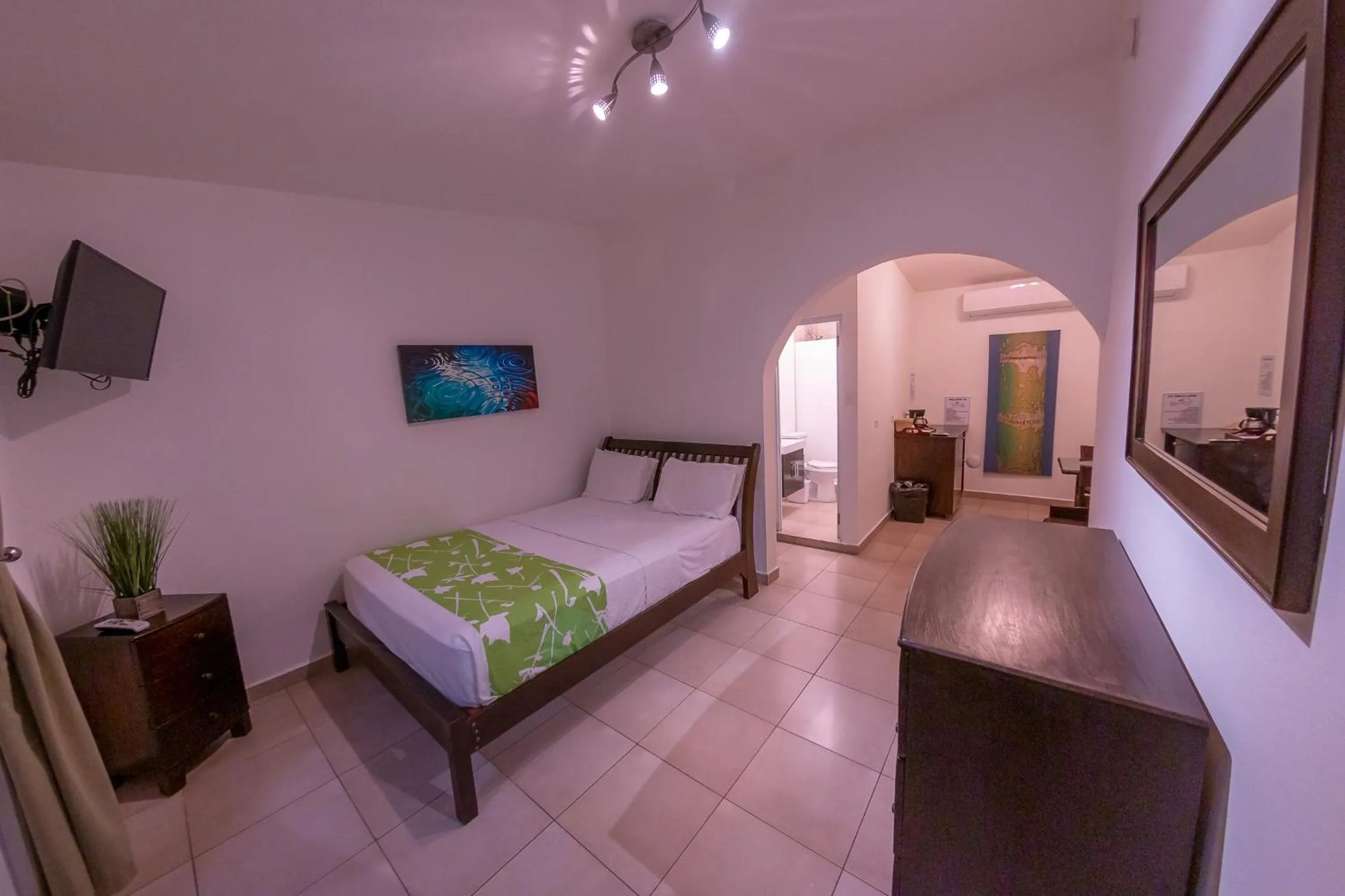 Photo of the whole room, Bed in Casa Verde Hotel - Steps to the Beach, Pool, Restaurant & Bar