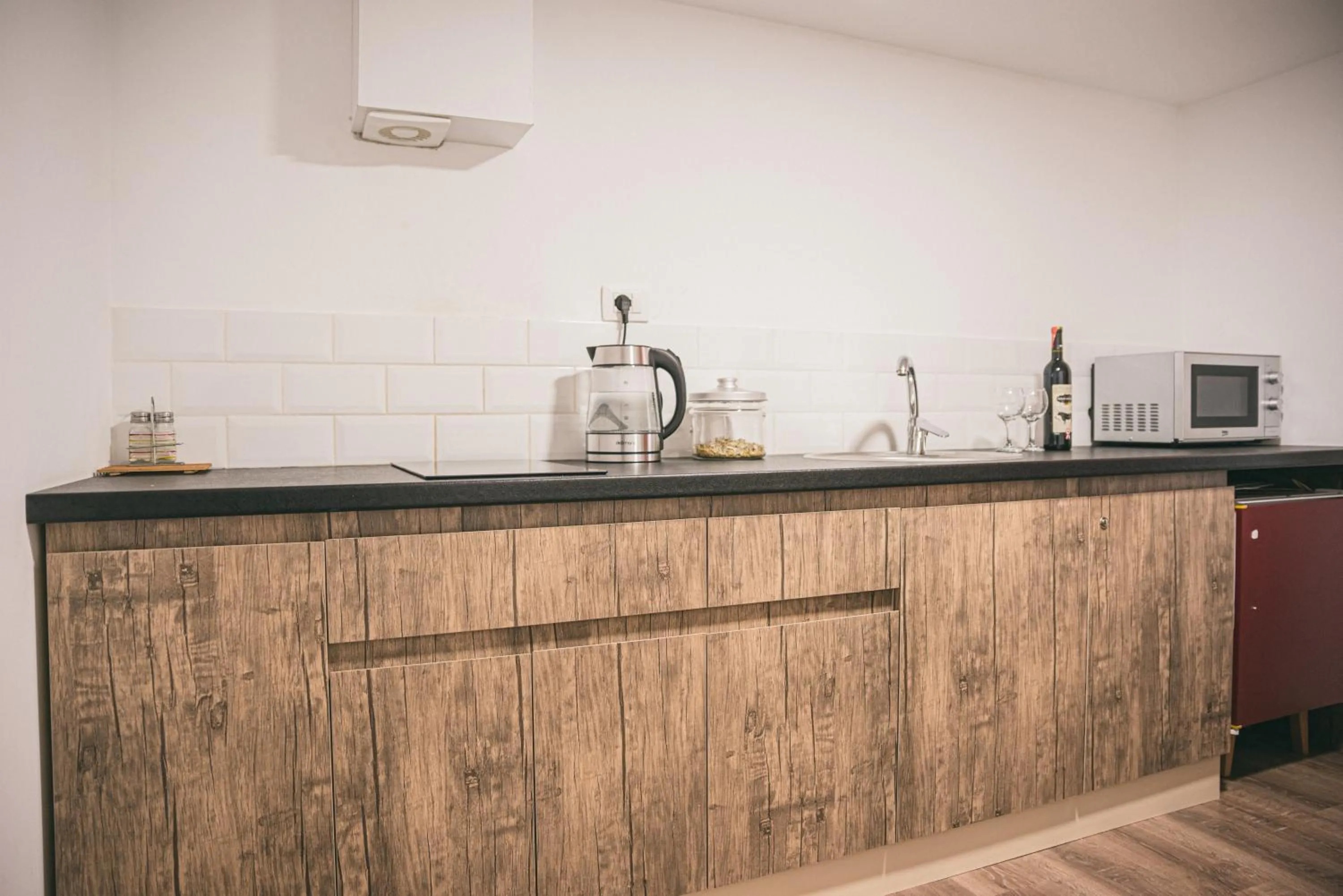 Kitchen or kitchenette in Sun&Moon Ohridlake Apartments