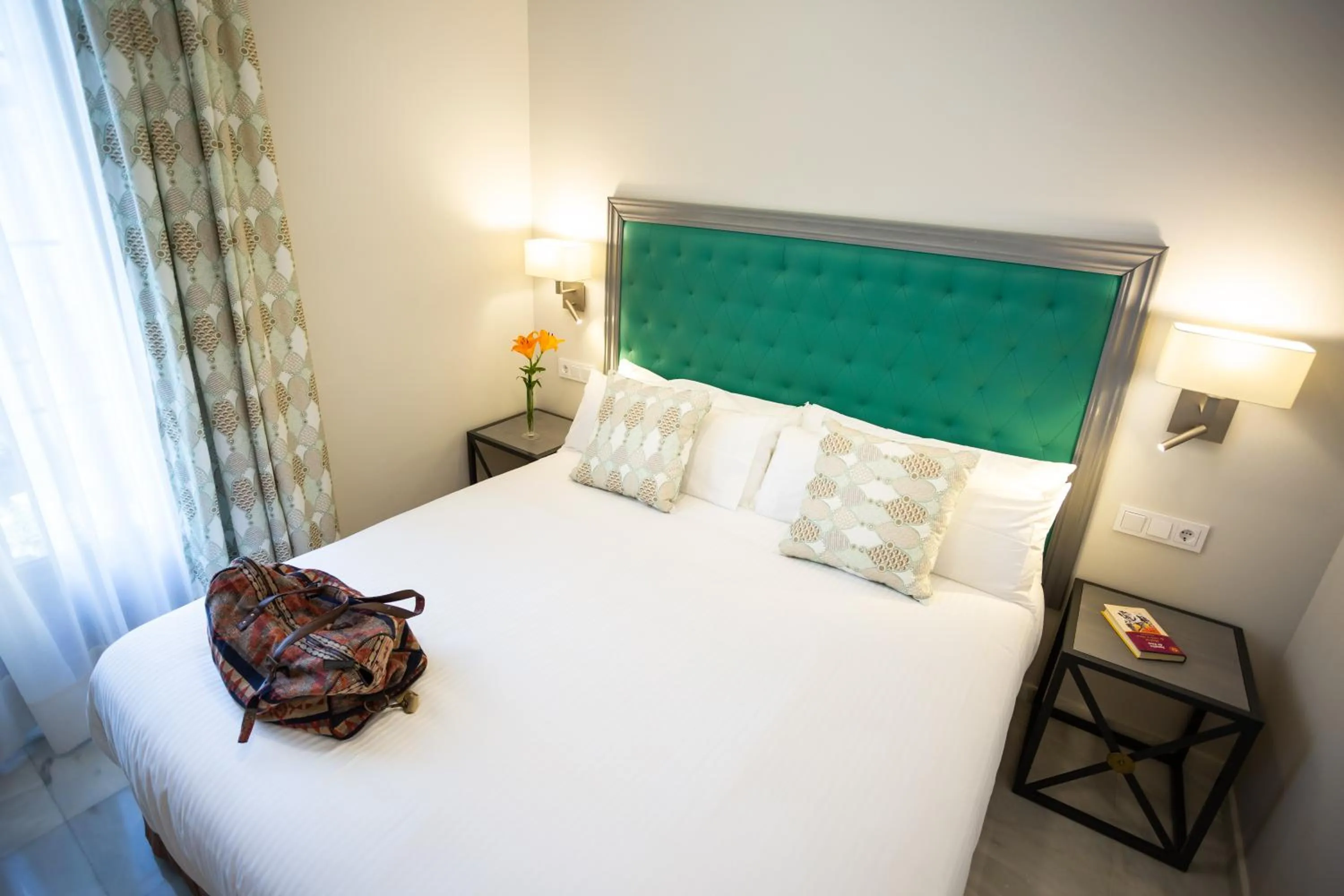 Bed in Plazuela del Carbón Suites