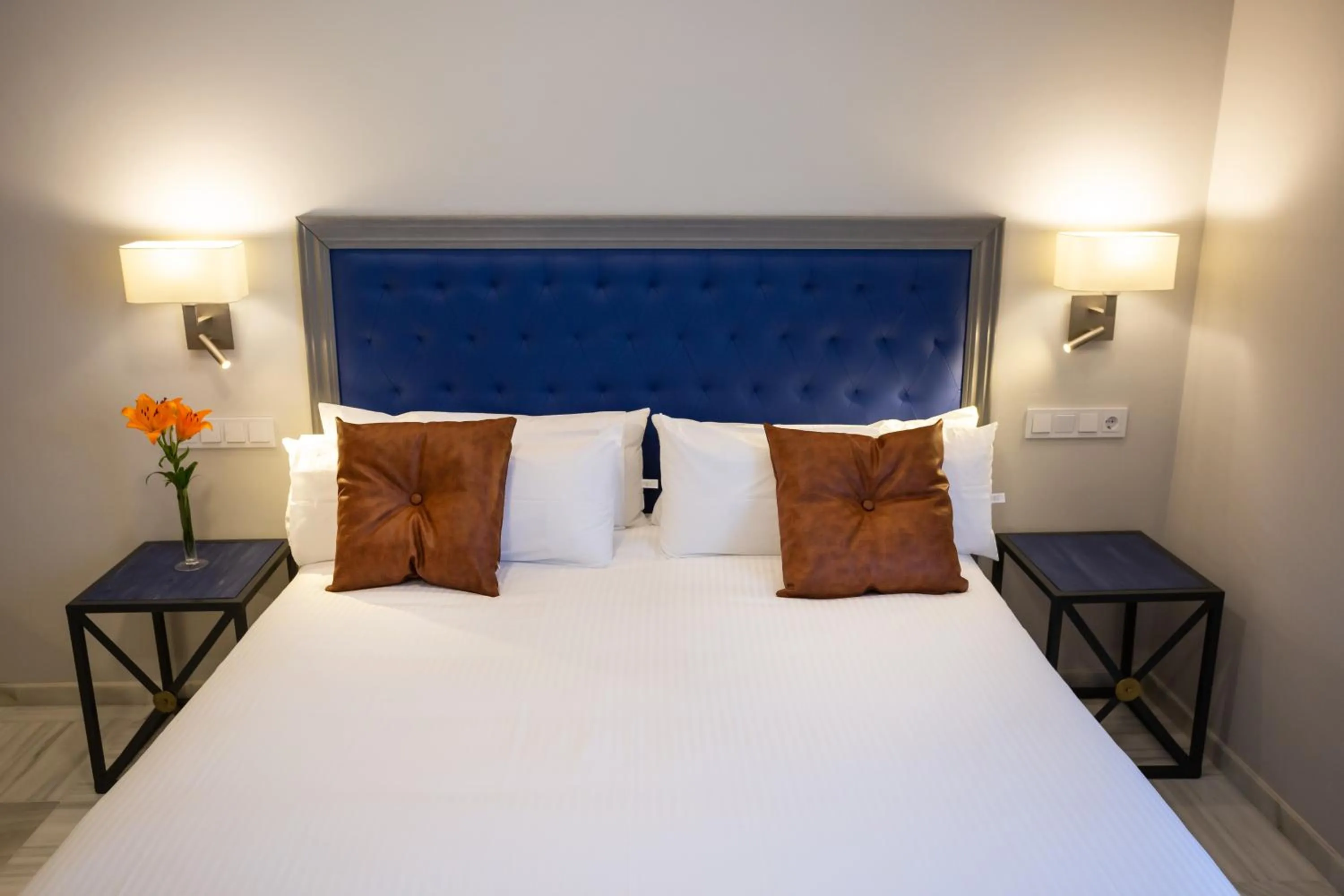 Bed in Plazuela del Carbón Suites