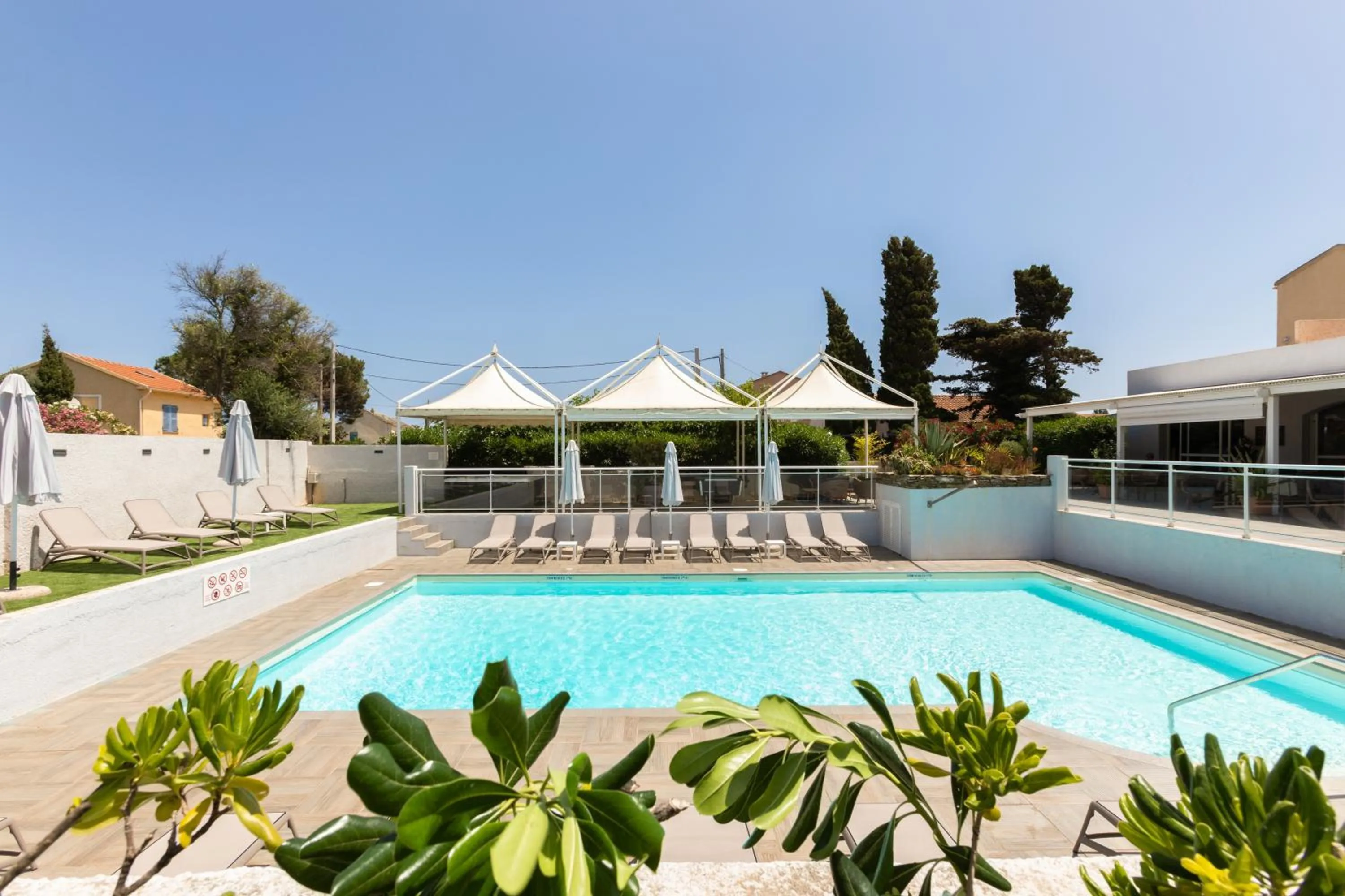 Swimming pool in Hotel U Ricordu & Spa