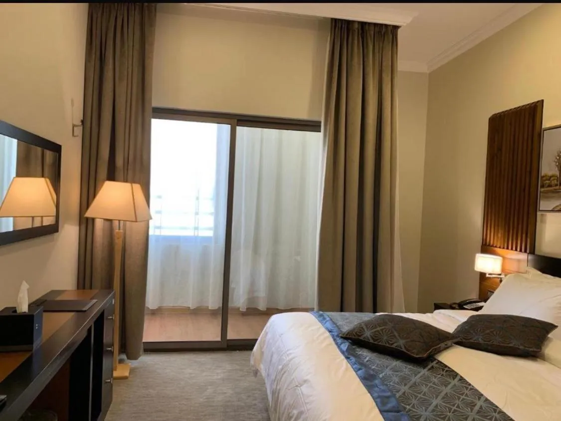 Bed in Tripper Inn - تريبر إن