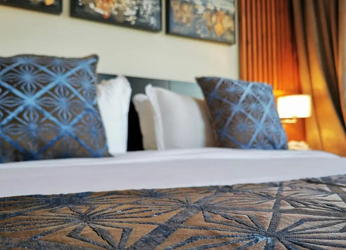 Bed in Tripper Inn - تريبر إن