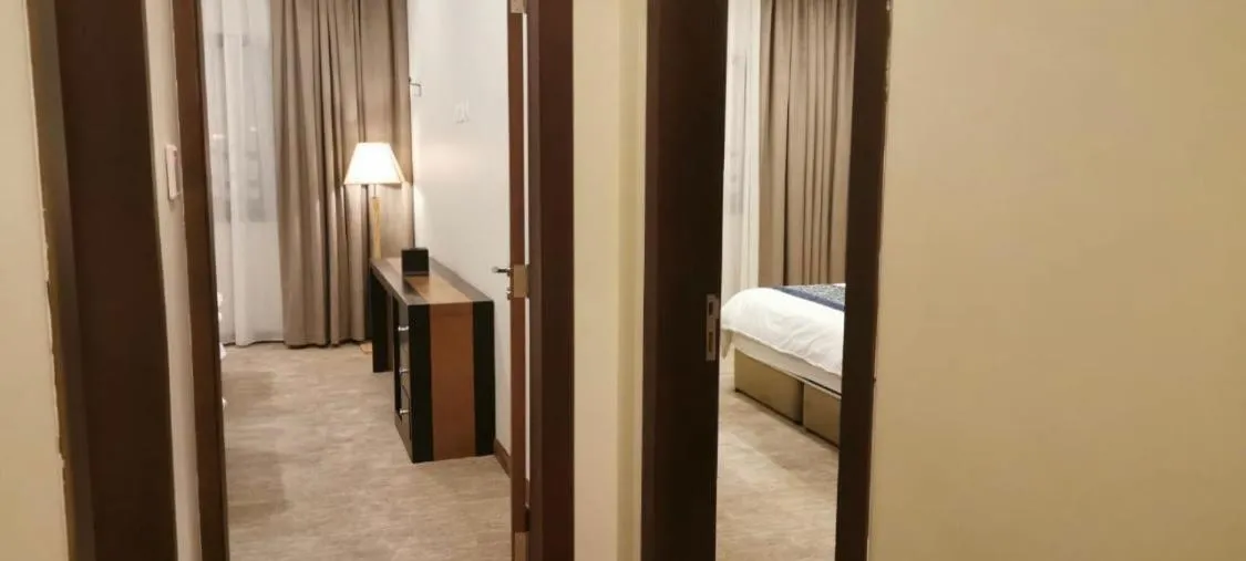 Bed in Tripper Inn - تريبر إن