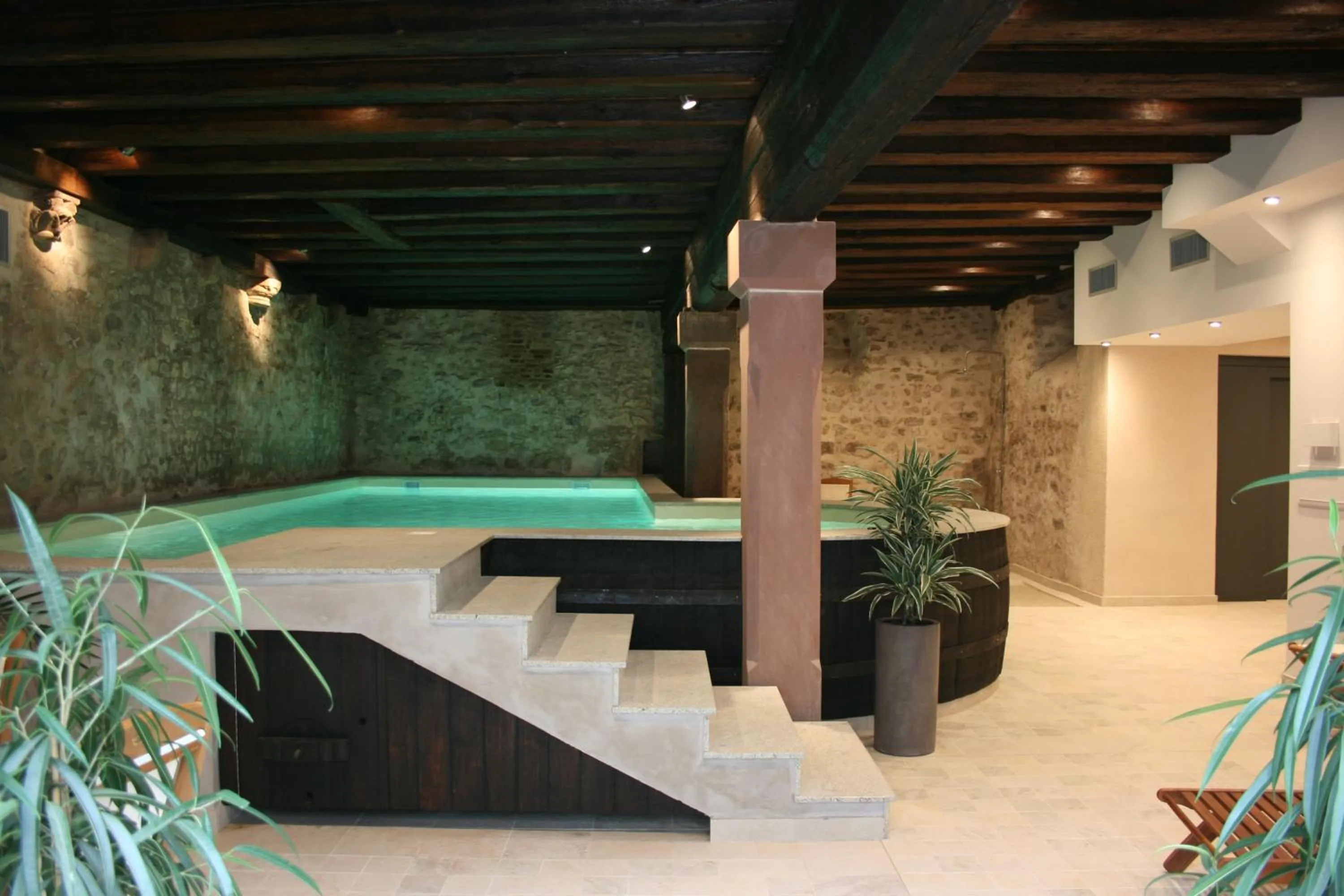 Swimming pool in La Cour du Bailli Suites & Spa