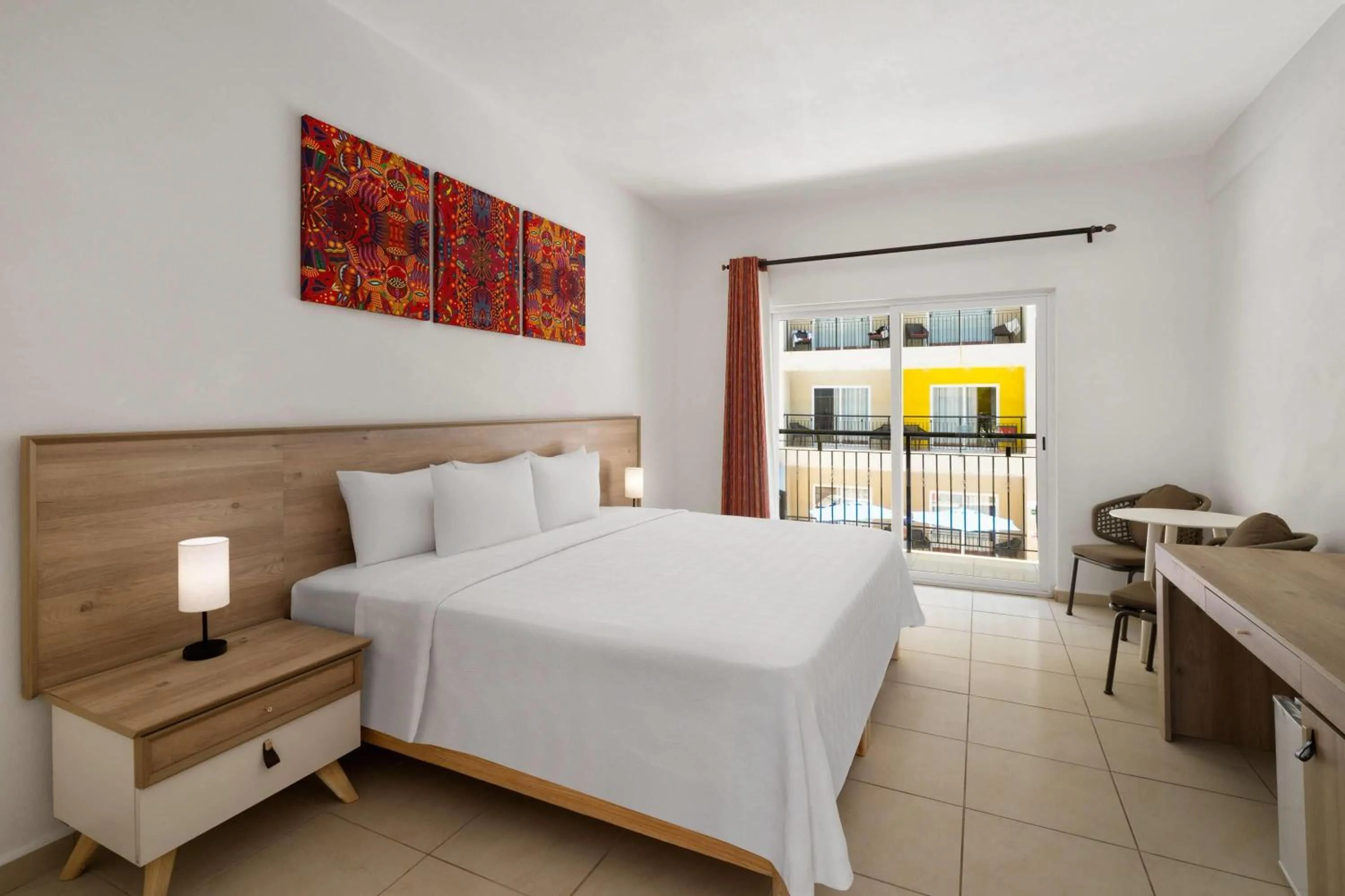 Photo of the whole room, Bed in Decameron Isla Coral Guayabitos, Ramada All-Inclusive Resort