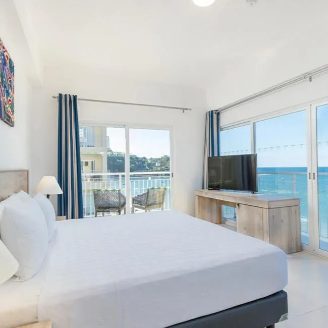 Bed in Decameron La Marina Guayabitos, Ramada All-Inclusive Resort