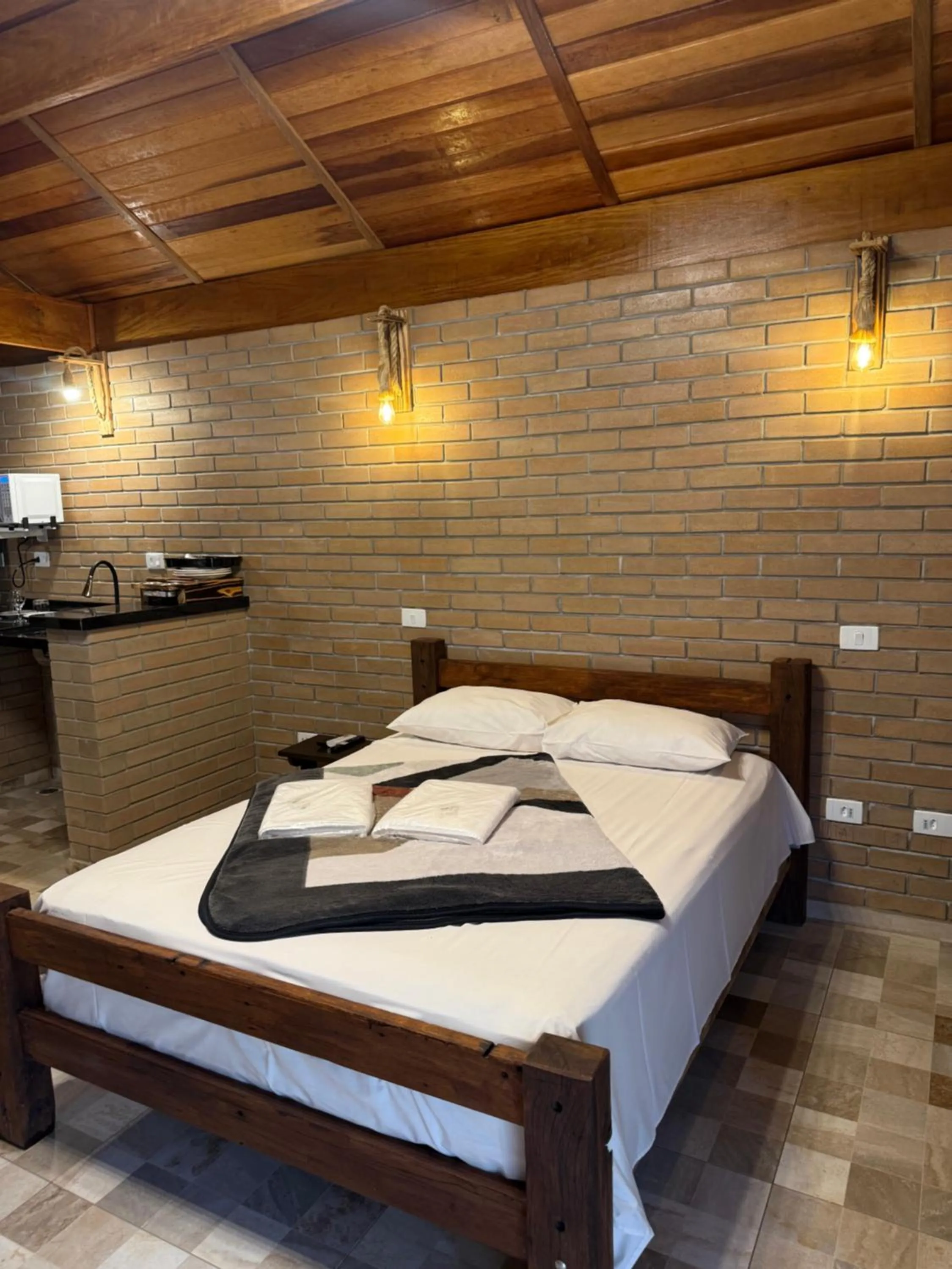 Bed in Chalés Marinelli em São Roque