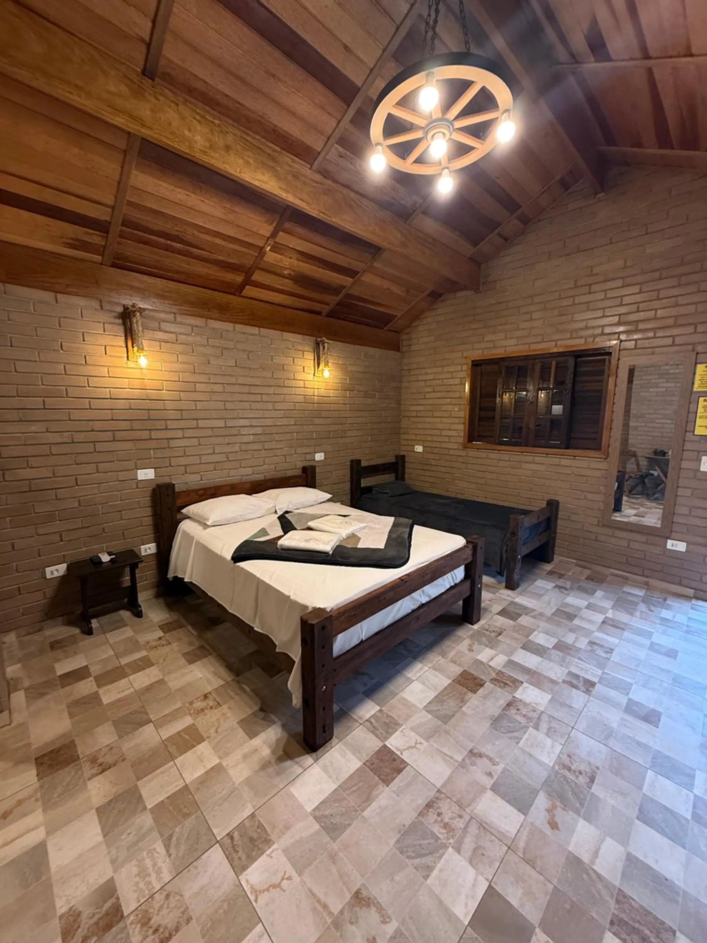 Bed in Chalés Marinelli em São Roque