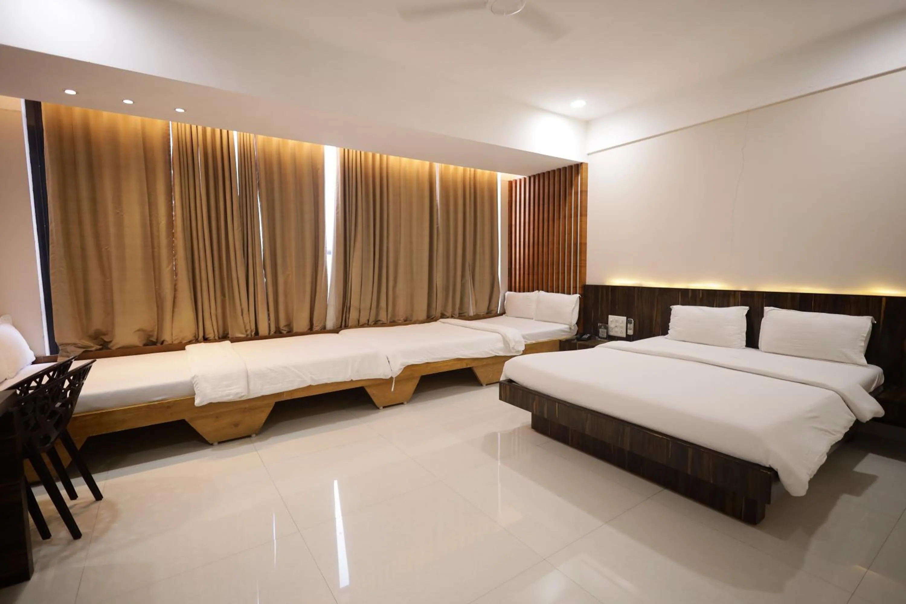 Bed in Hotel President Banquet & Lawn