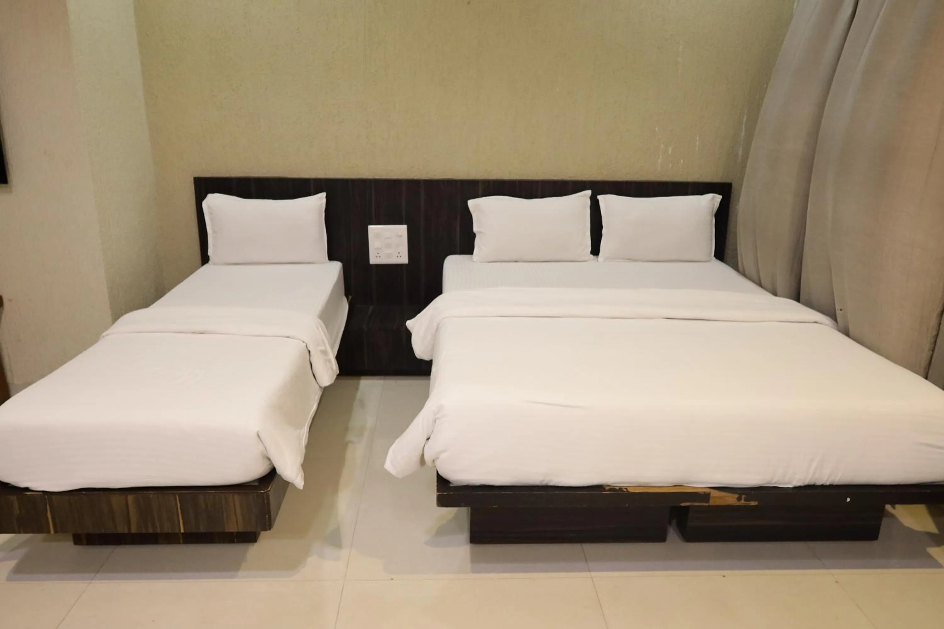 Bed in Hotel President Banquet & Lawn