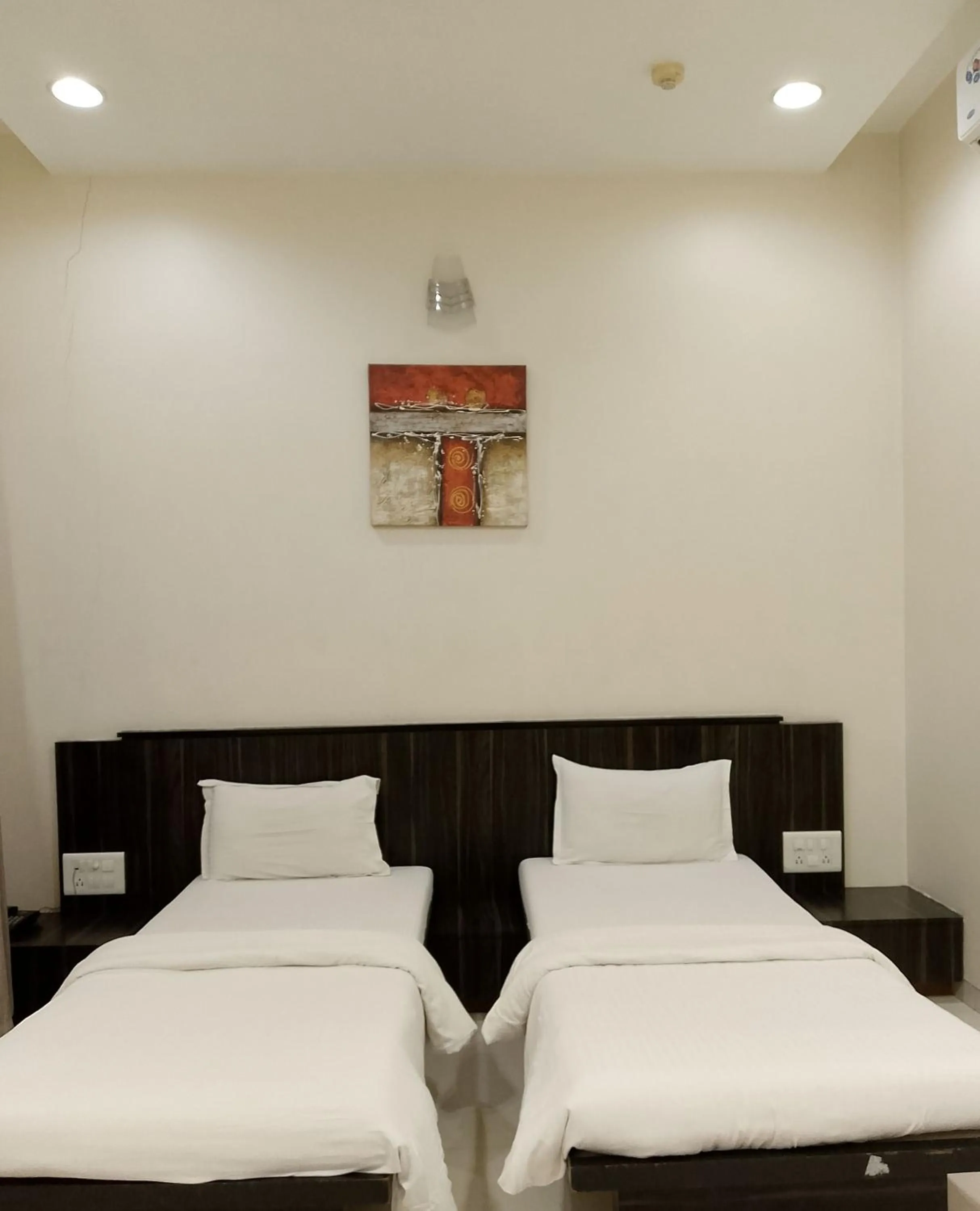 Bed in Hotel President Banquet & Lawn