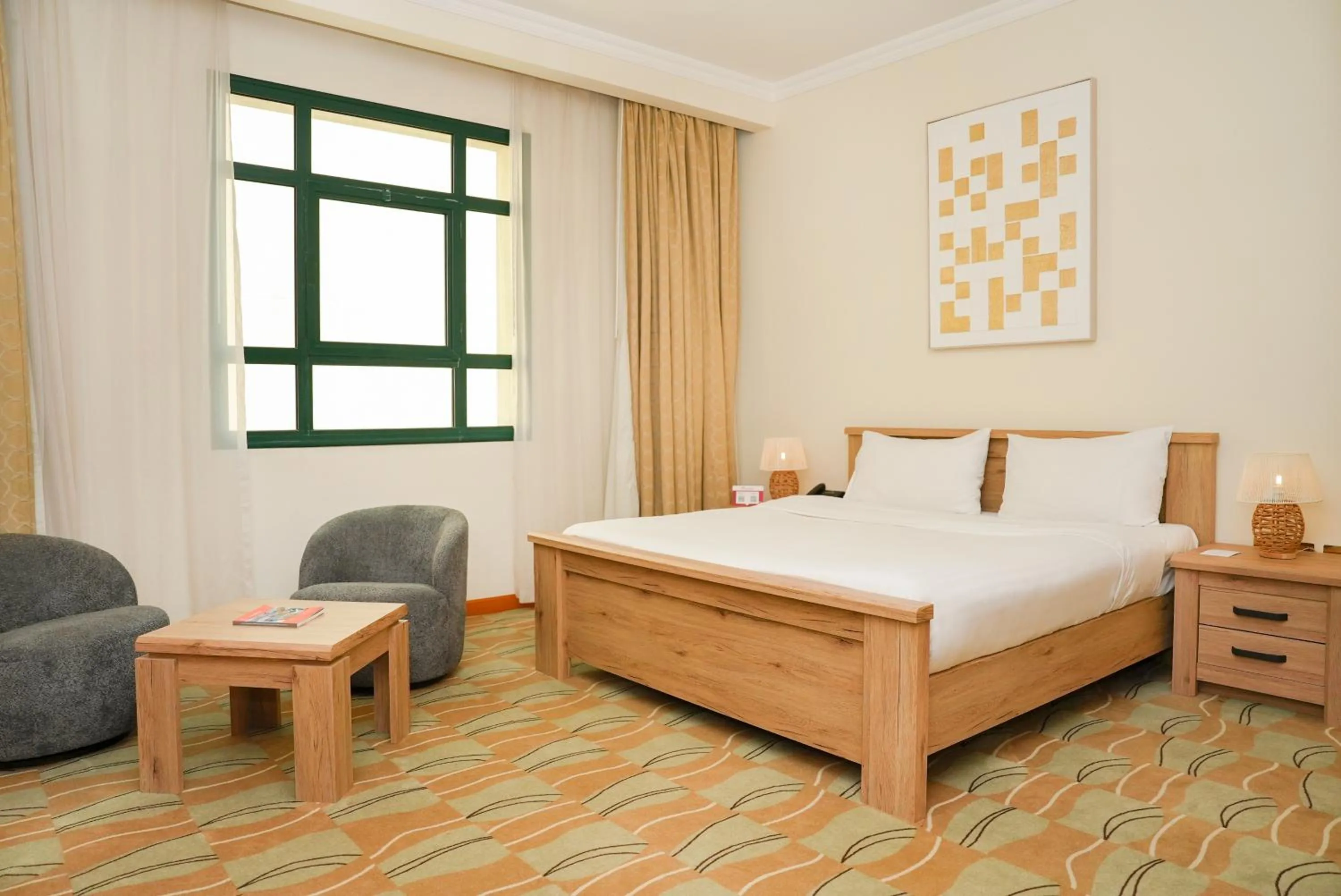 Seating area, Bed in Swiss-Belinn Doha