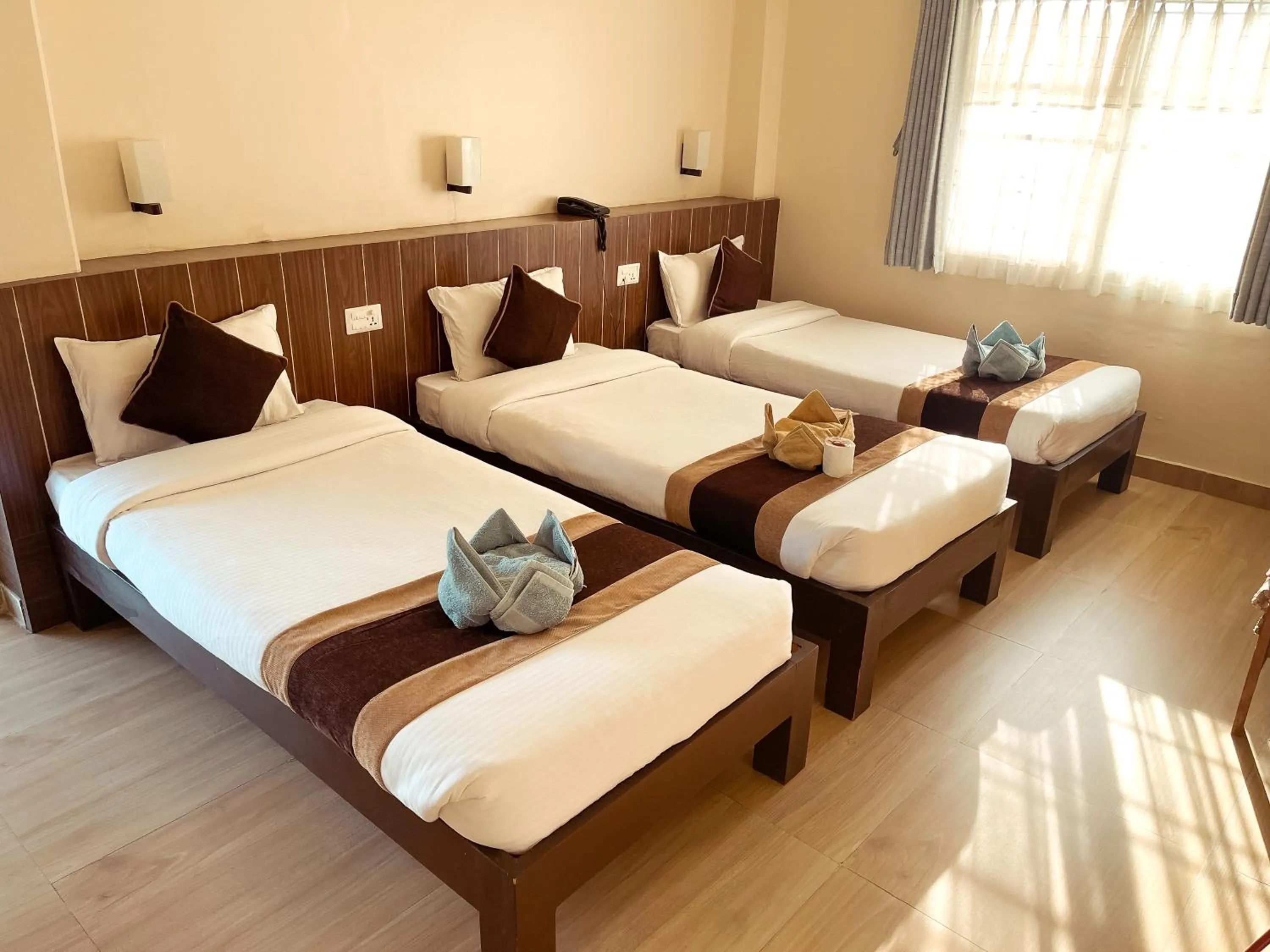 Photo of the whole room, Bed in Pokhara Tourist Home