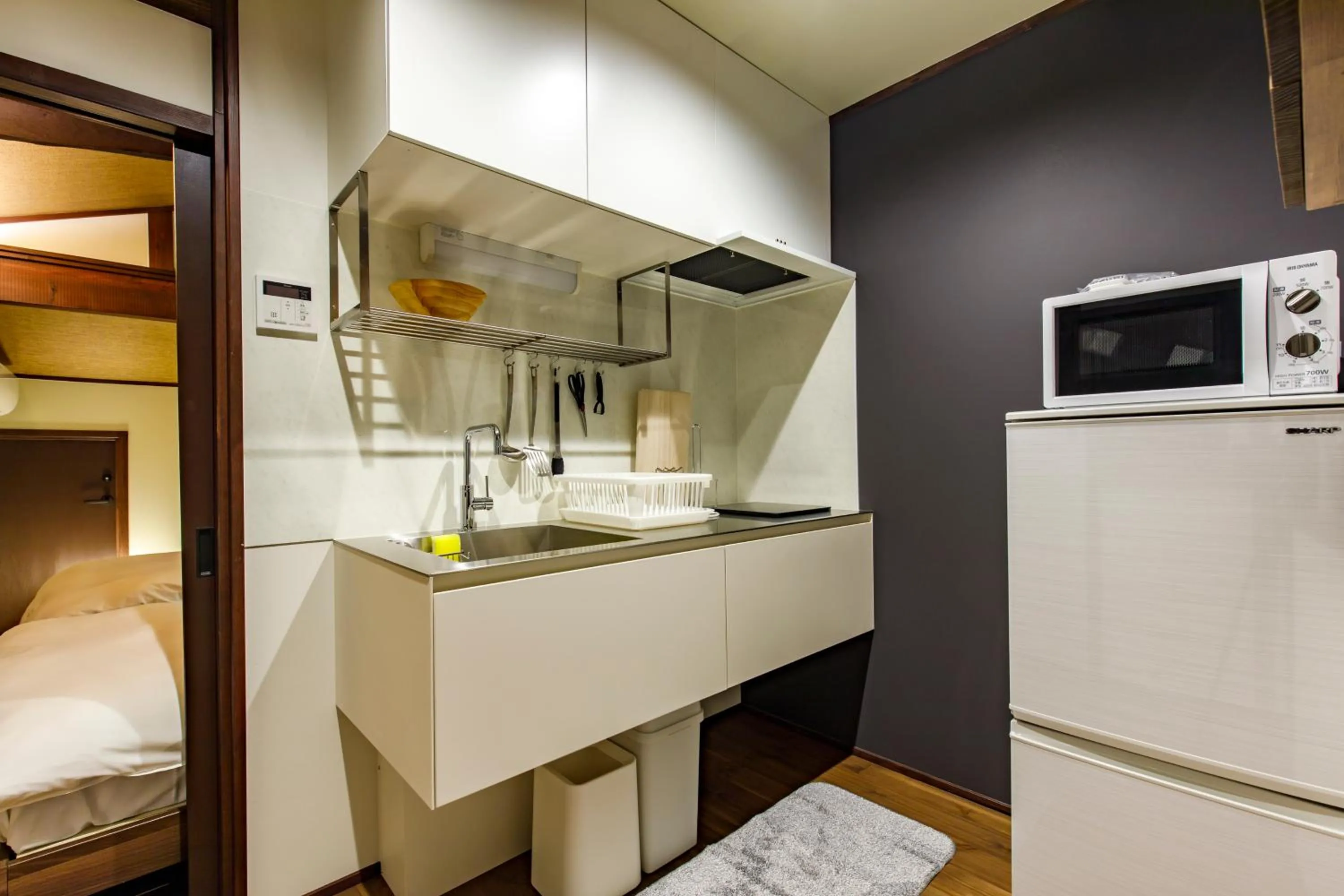 Bed in Wow! KANAZAWA STAY